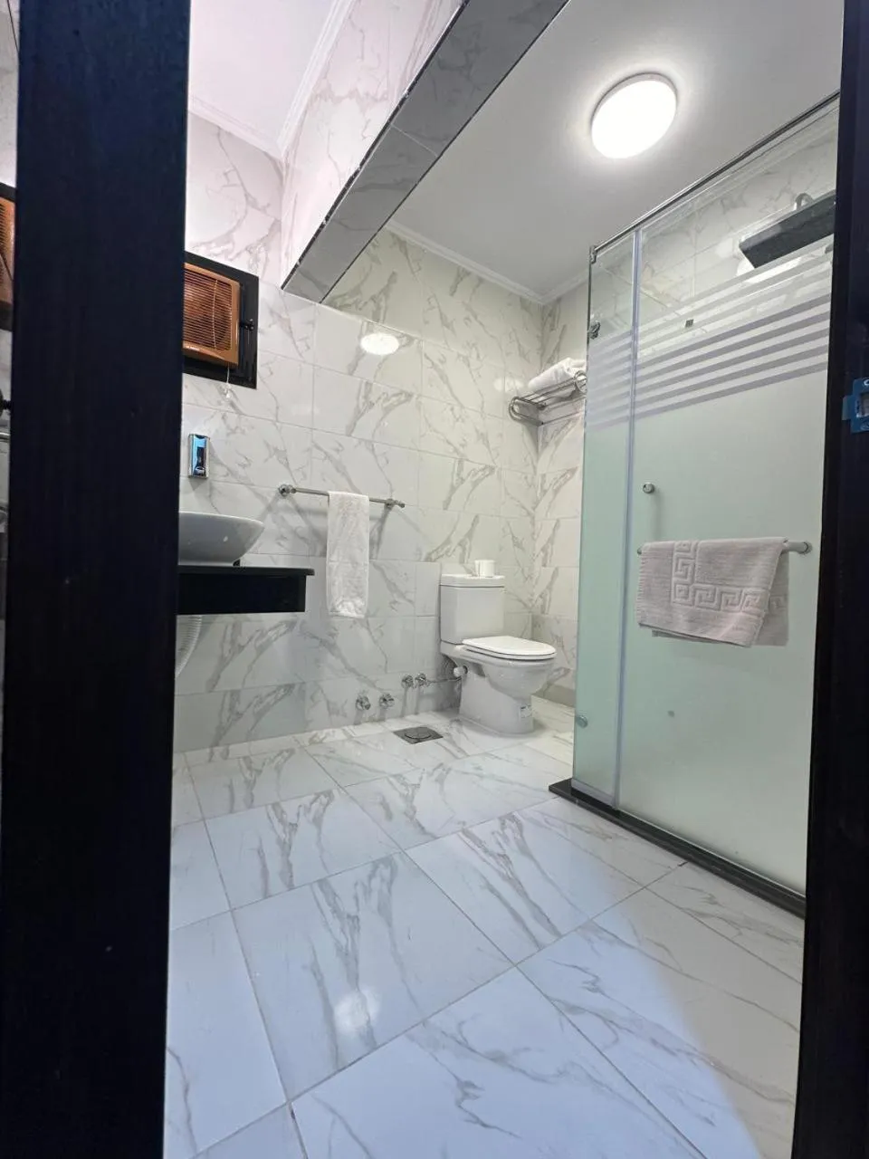 Toilet, Bed in Aura Inn Hotel Cairo