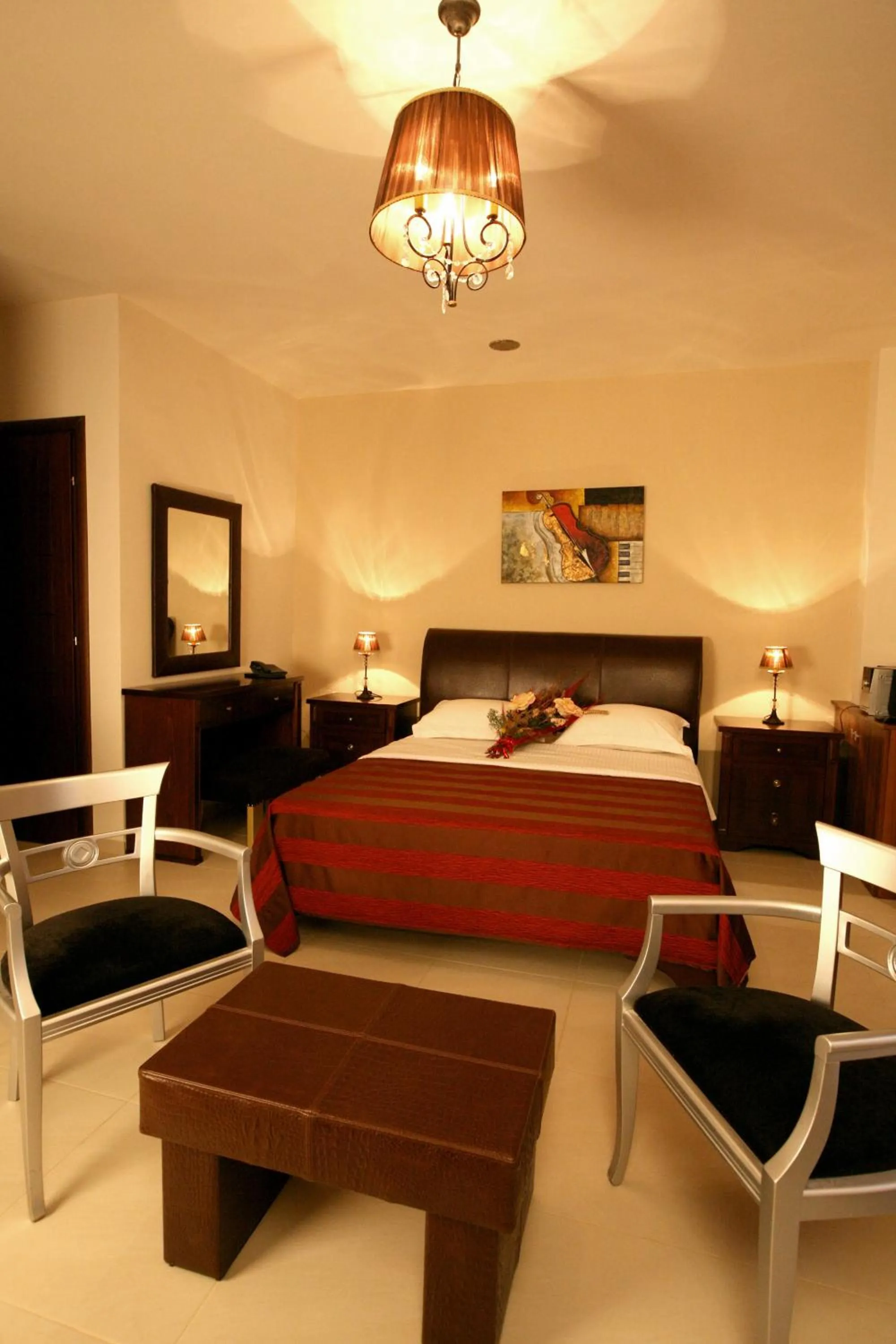 Bed in Epavlis Meteora Suites Hotel