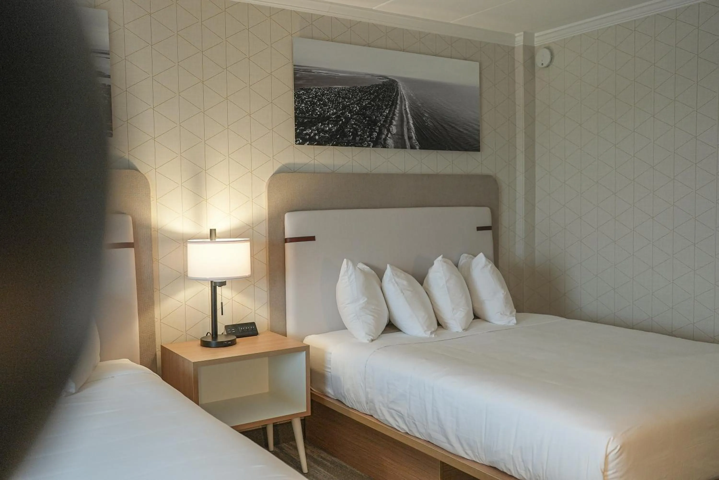 Bed in The Boulevard Hotel