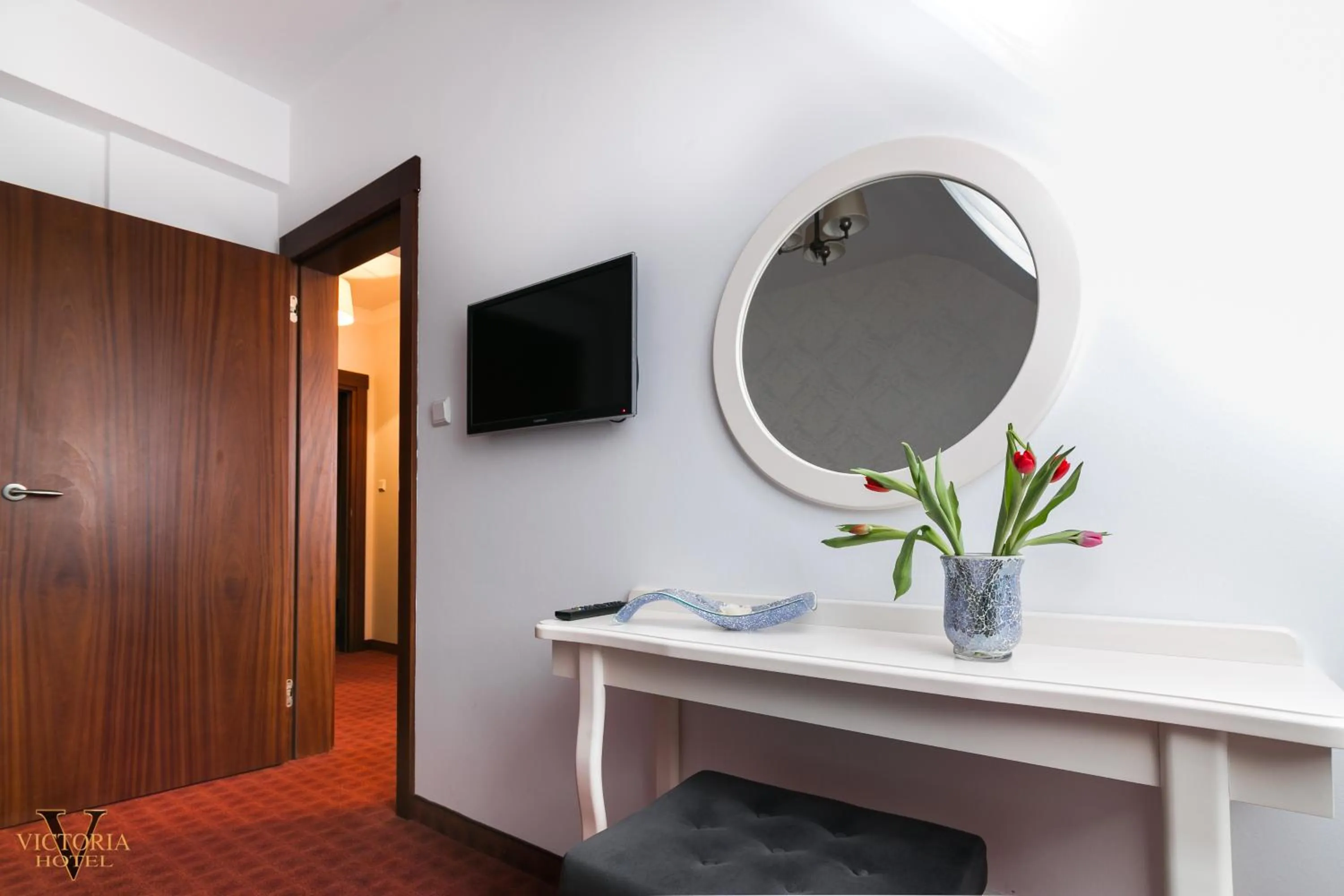 Communal lounge/ TV room in Hotel Victoria