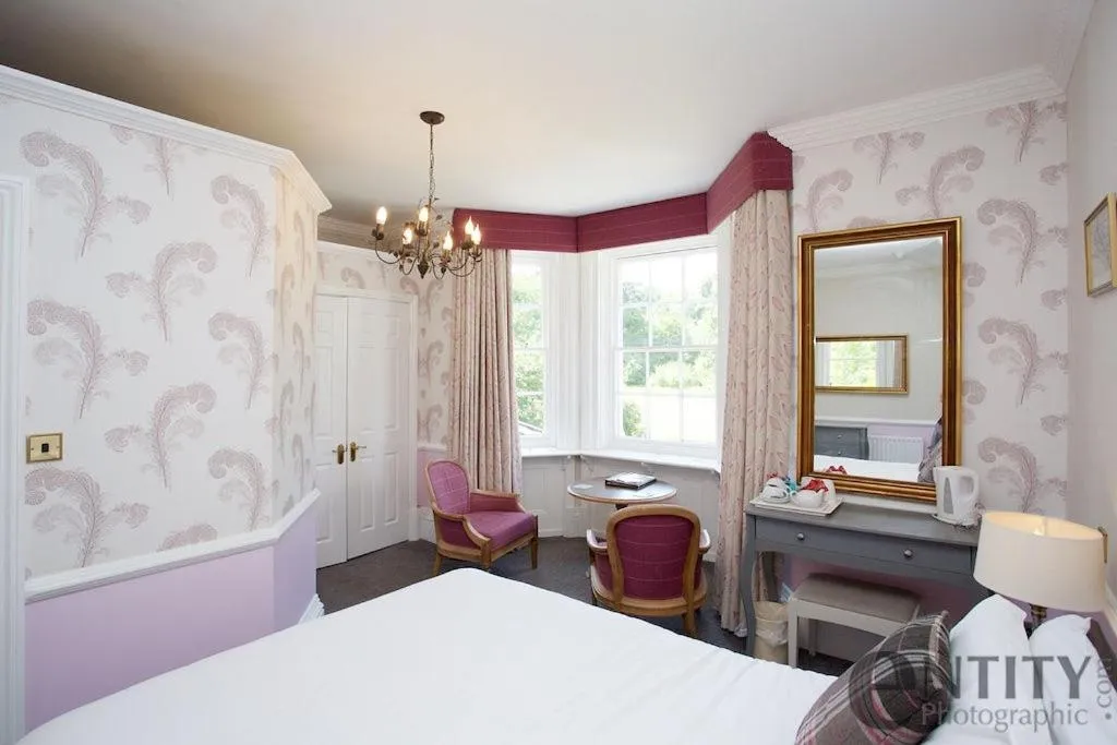 Bedroom, Bed in Woodlands Lodge Hotel