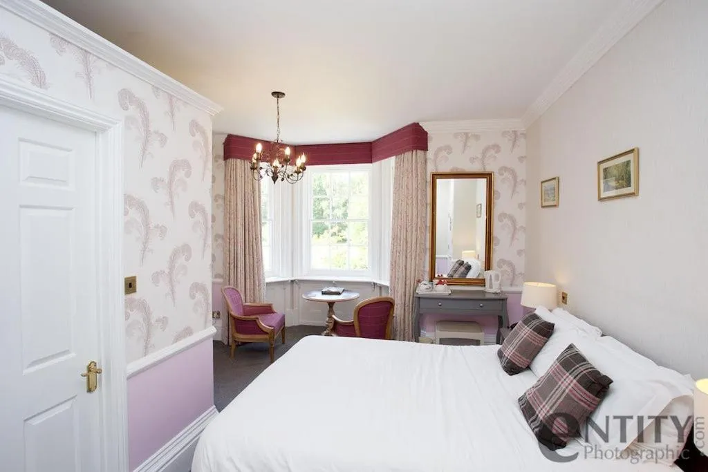 Bed in Woodlands Lodge Hotel