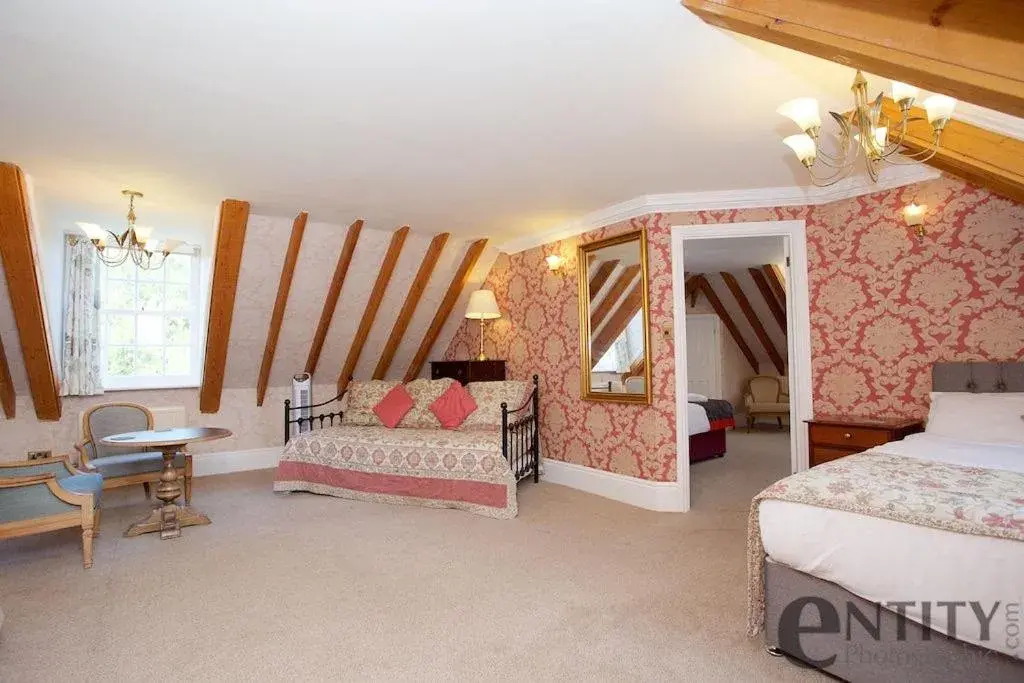 Seating area, Bed in Woodlands Lodge Hotel Seating area, Bed in Woodlands Lodge Hotel