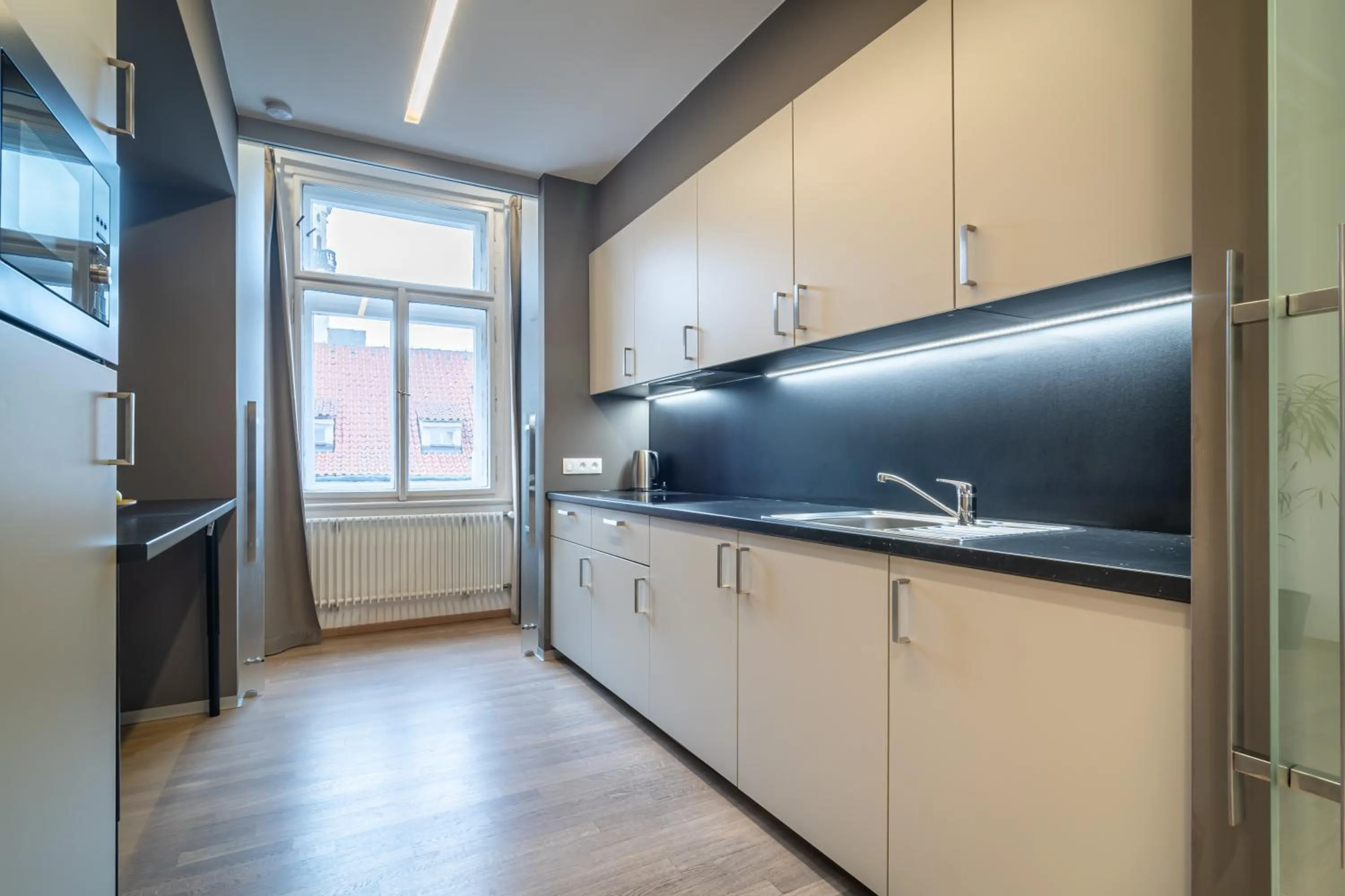 Kitchen or kitchenette in Royal Road Residence