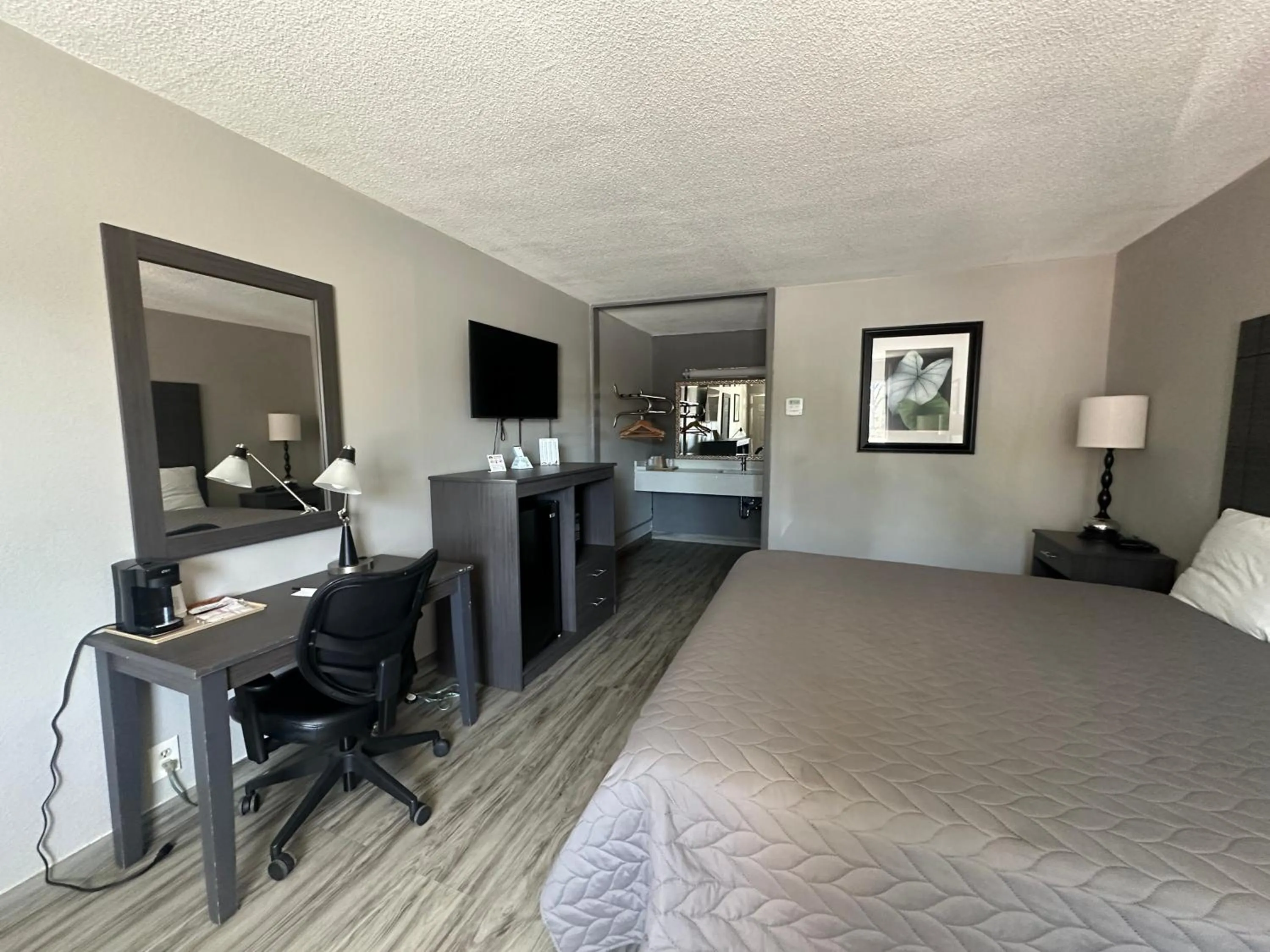 Bedroom in Executive Inn Locust Grove by Capital O