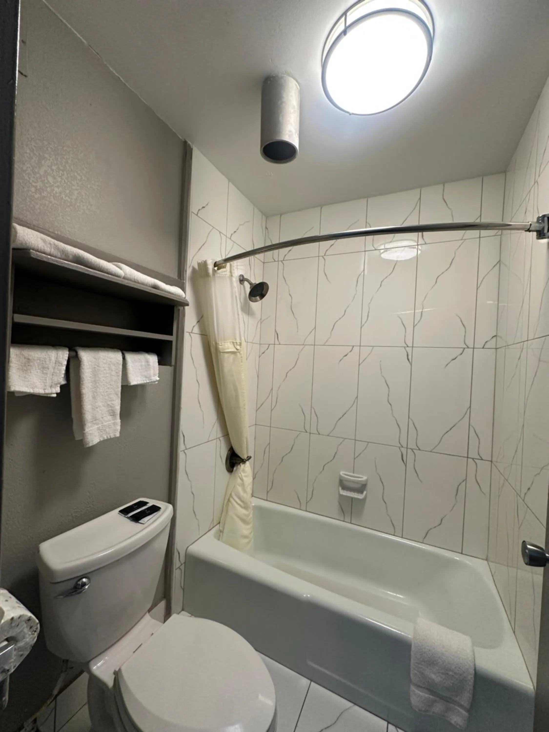 Bathroom in Executive Inn Locust Grove by Capital O