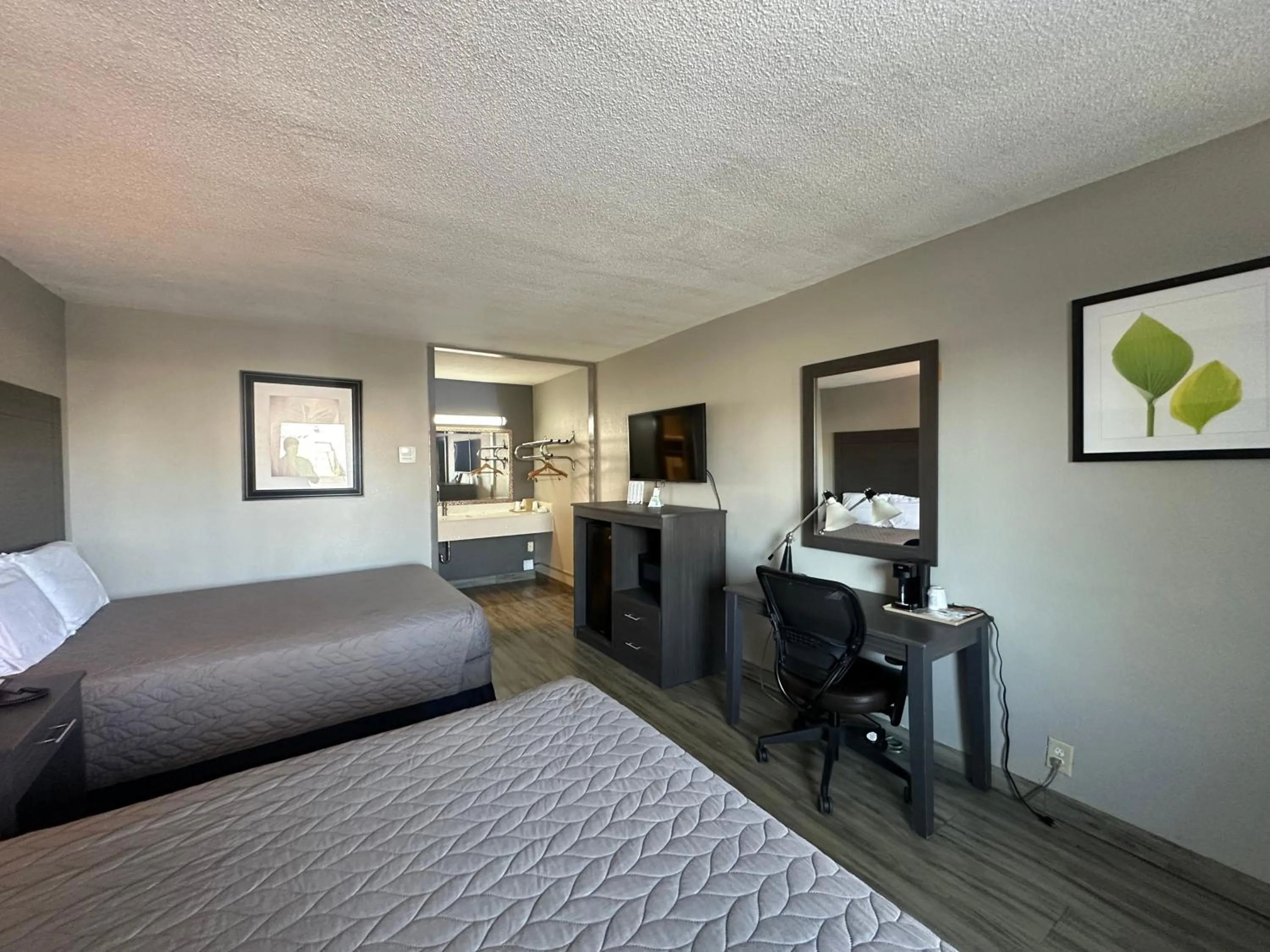 Bedroom in Executive Inn Locust Grove by Capital O