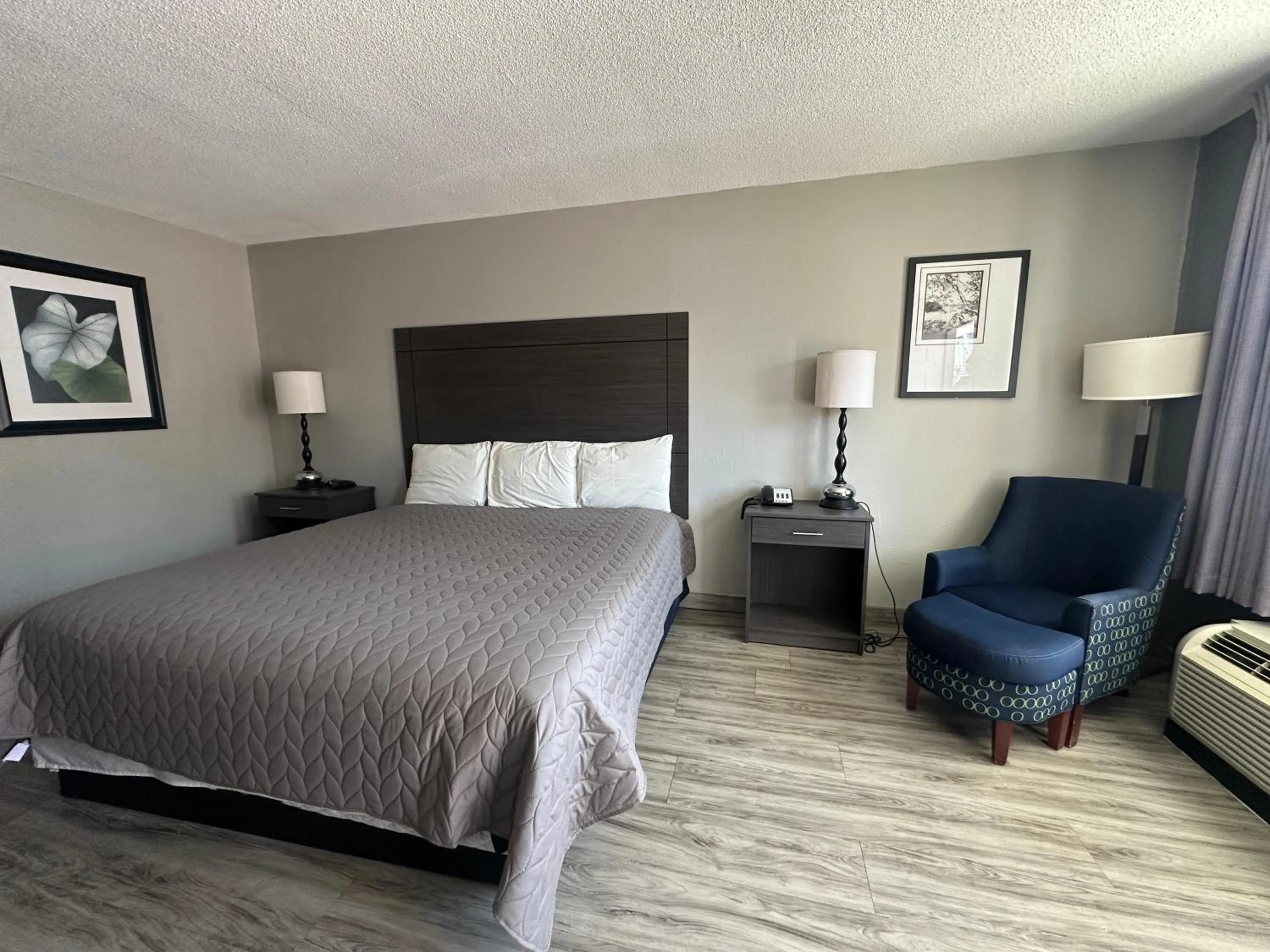 Bedroom in Executive Inn Locust Grove by Capital O