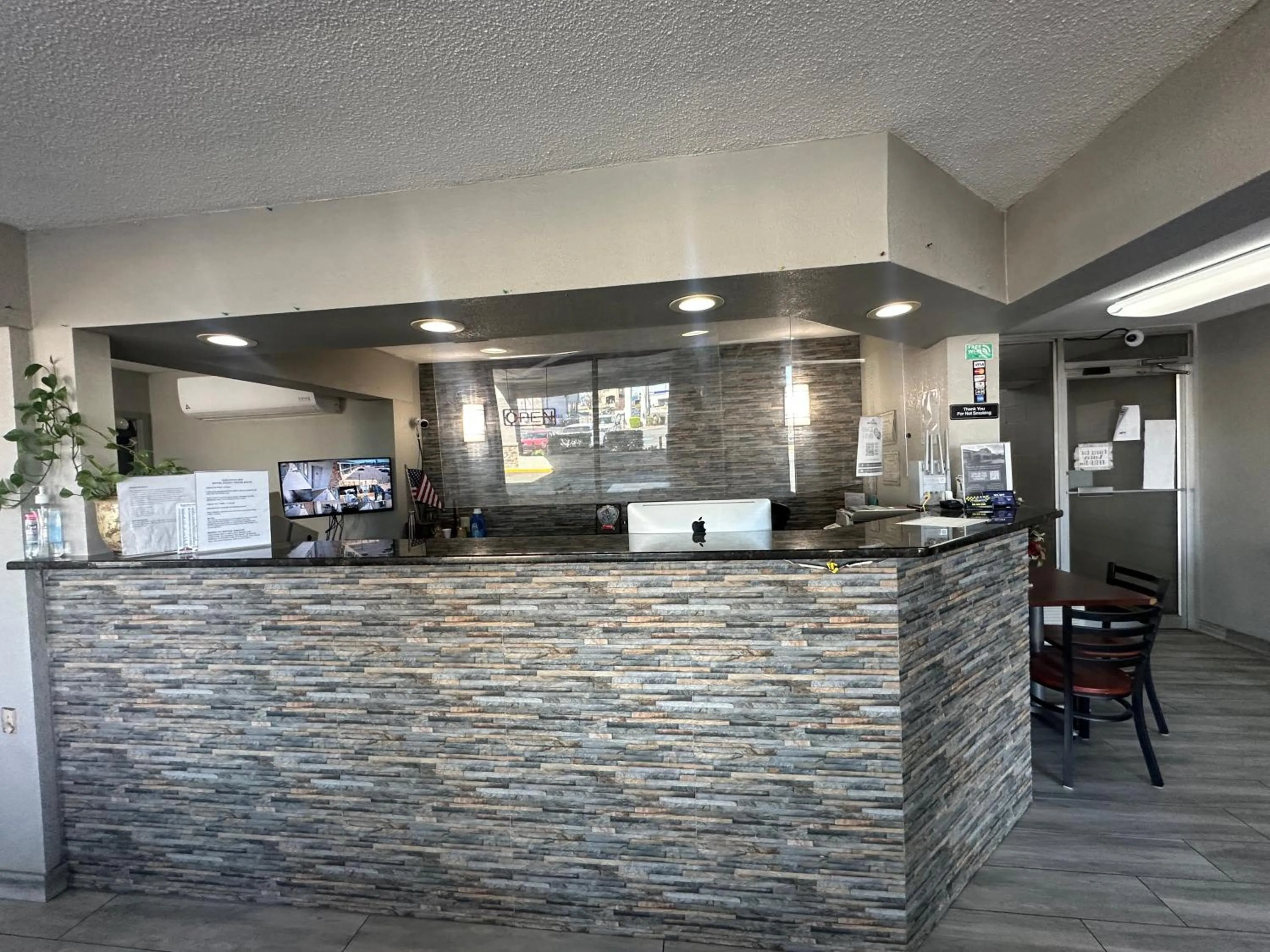 Lobby or reception in Executive Inn Locust Grove by Capital O
