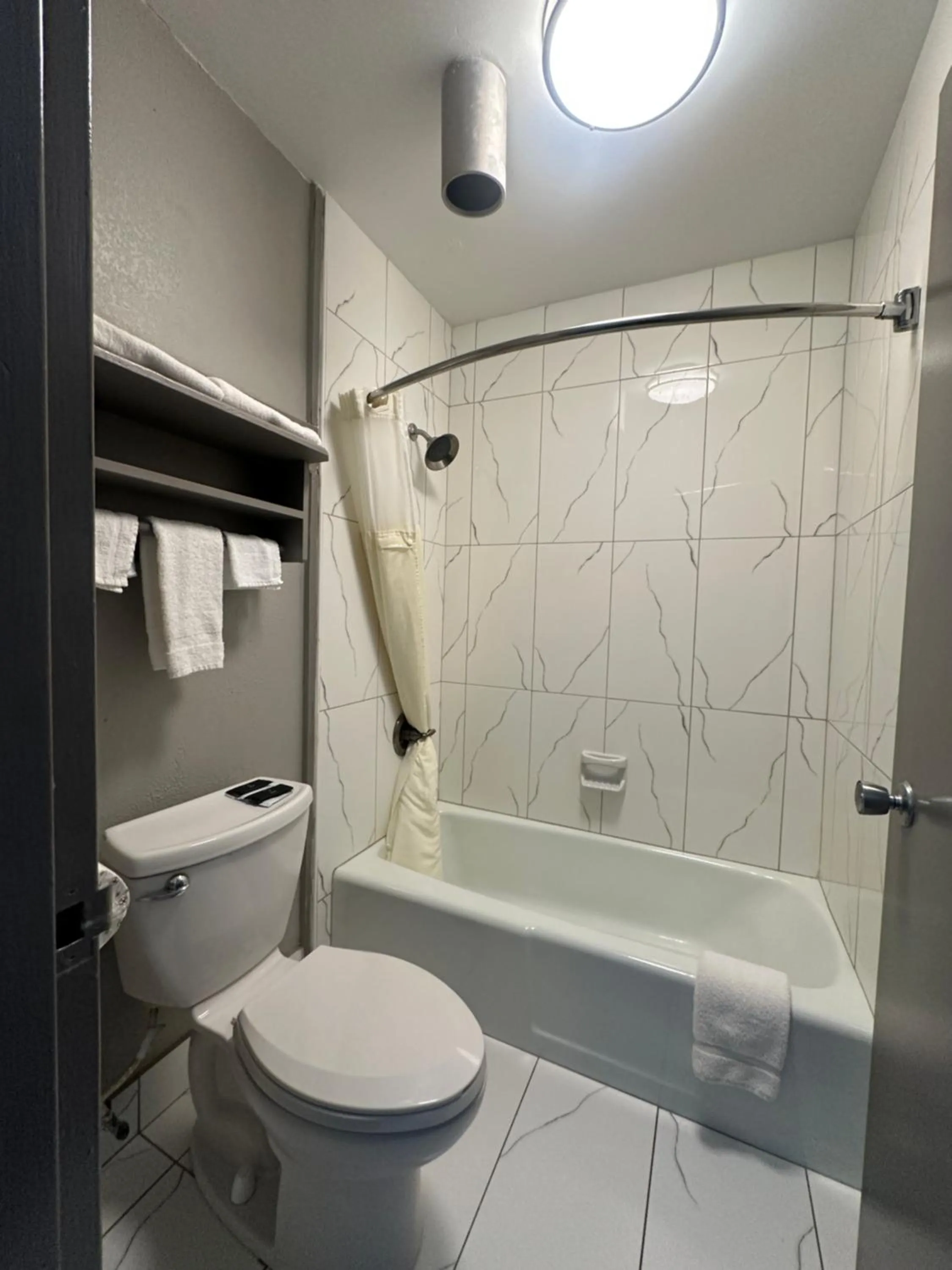 Bathroom in Executive Inn Locust Grove by Capital O