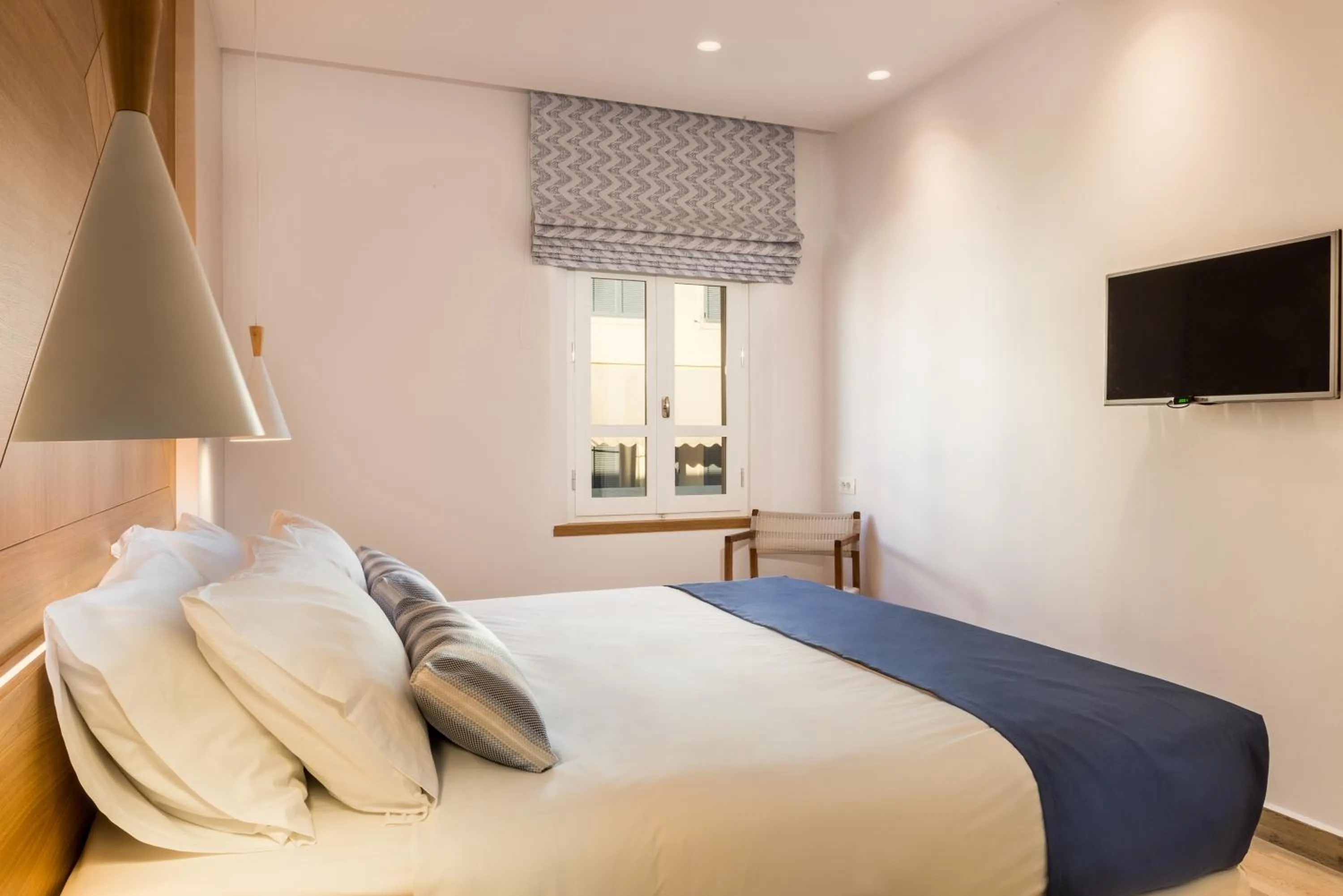 Bed in Avra Apartments Venetian Harbour