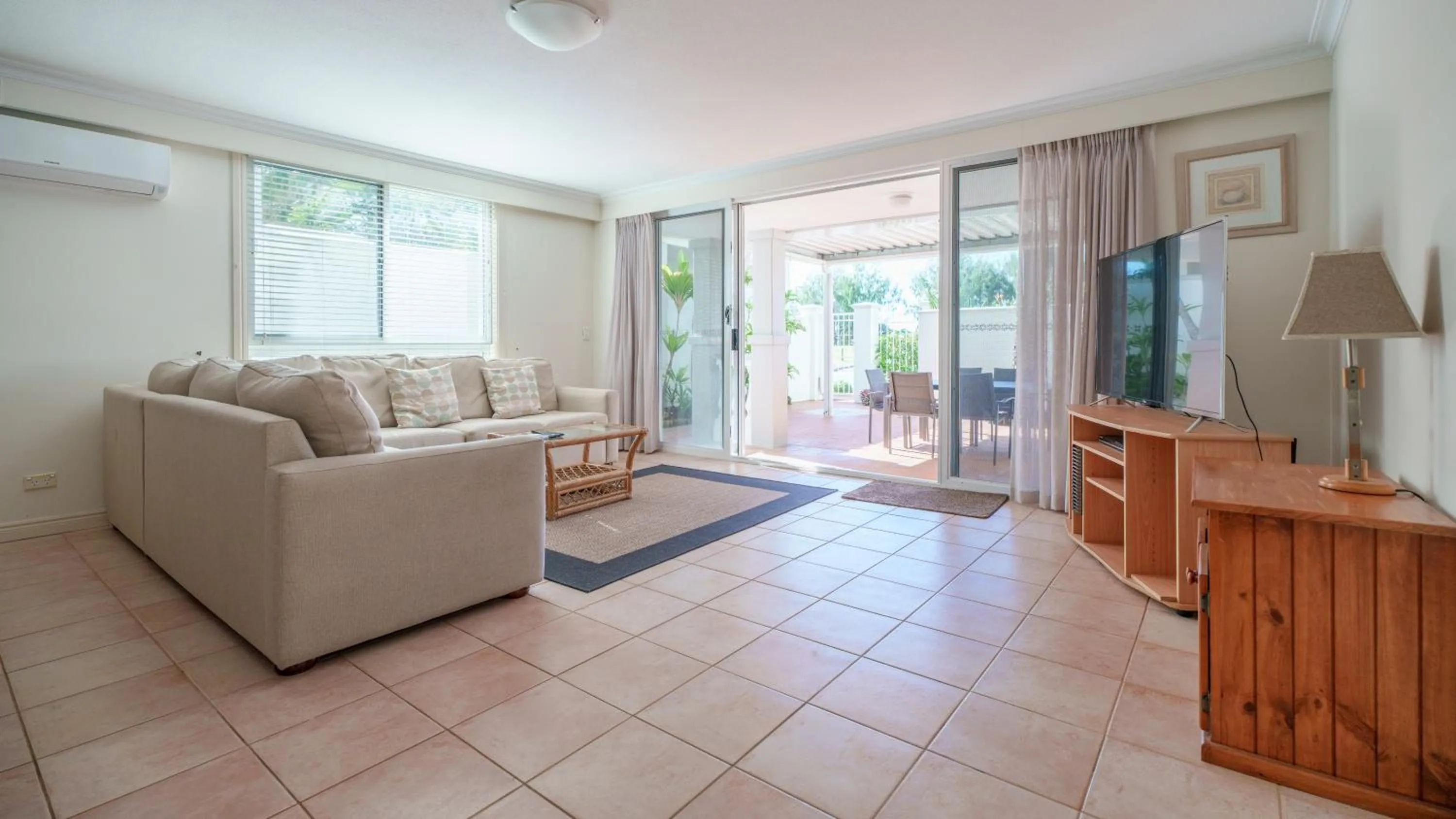 Communal lounge/ TV room in La Grande Apartments