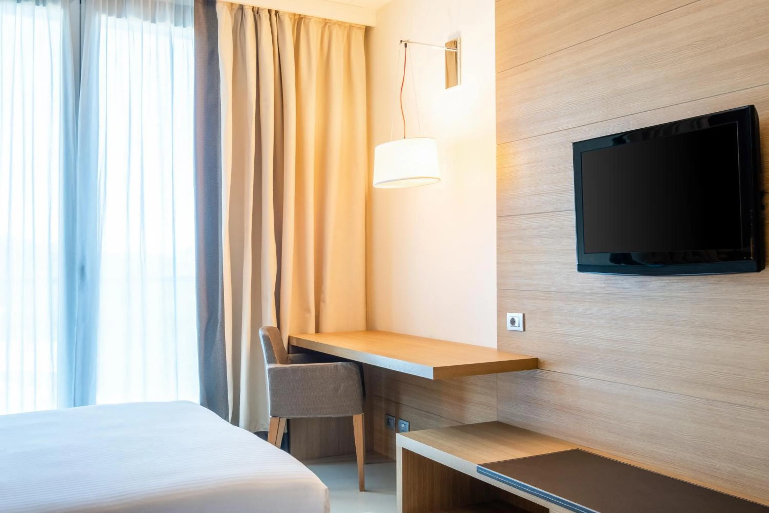 TV and multimedia, Bed in HSM Hotel San Martino