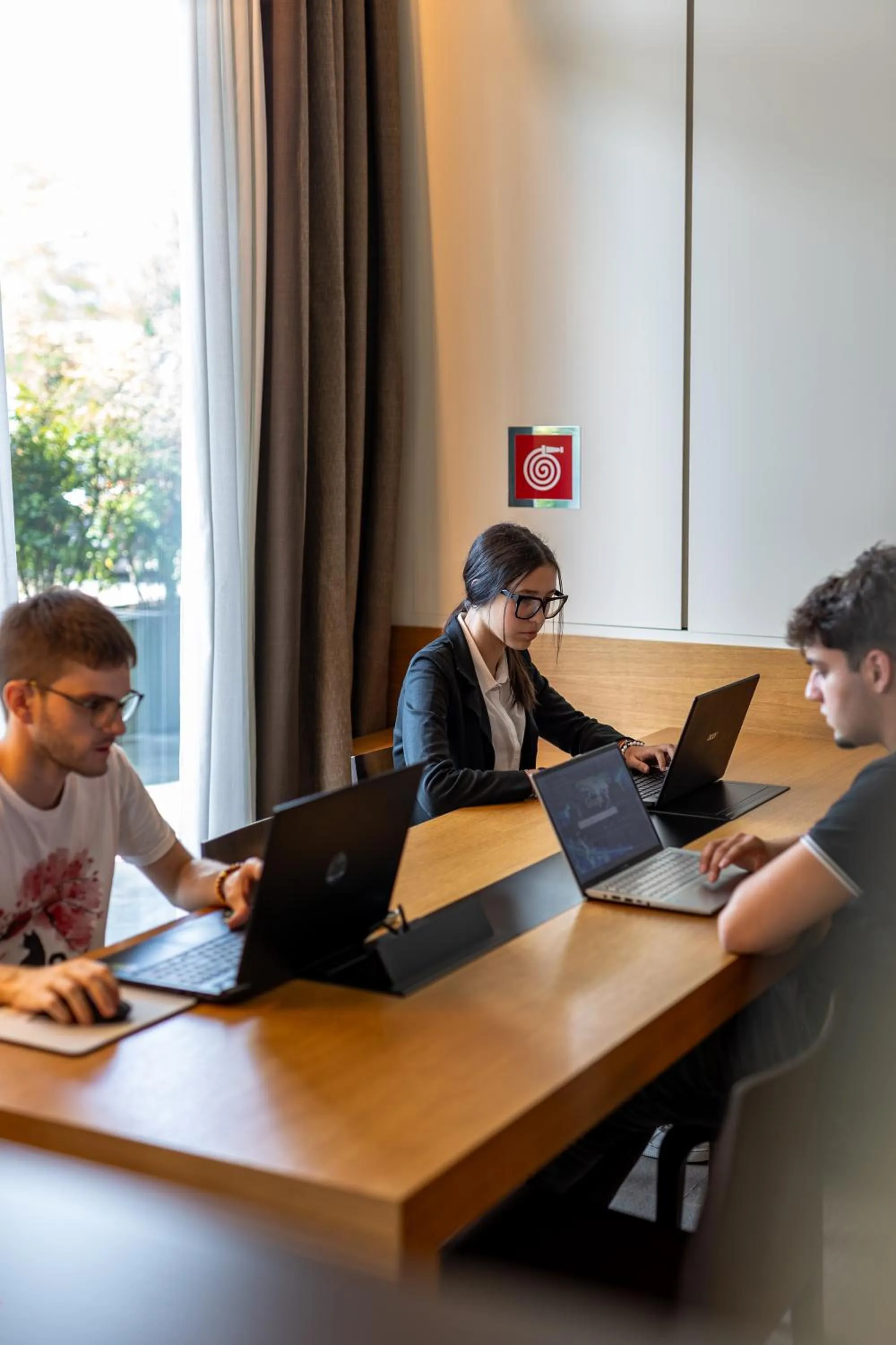 Communal lounge/ TV room in HSM Hotel San Martino