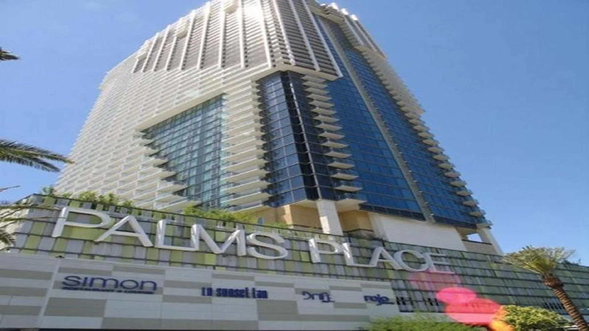 Property logo or sign in Palms Place Beautiful High Rise Condo with Strip Views 23rd Floor