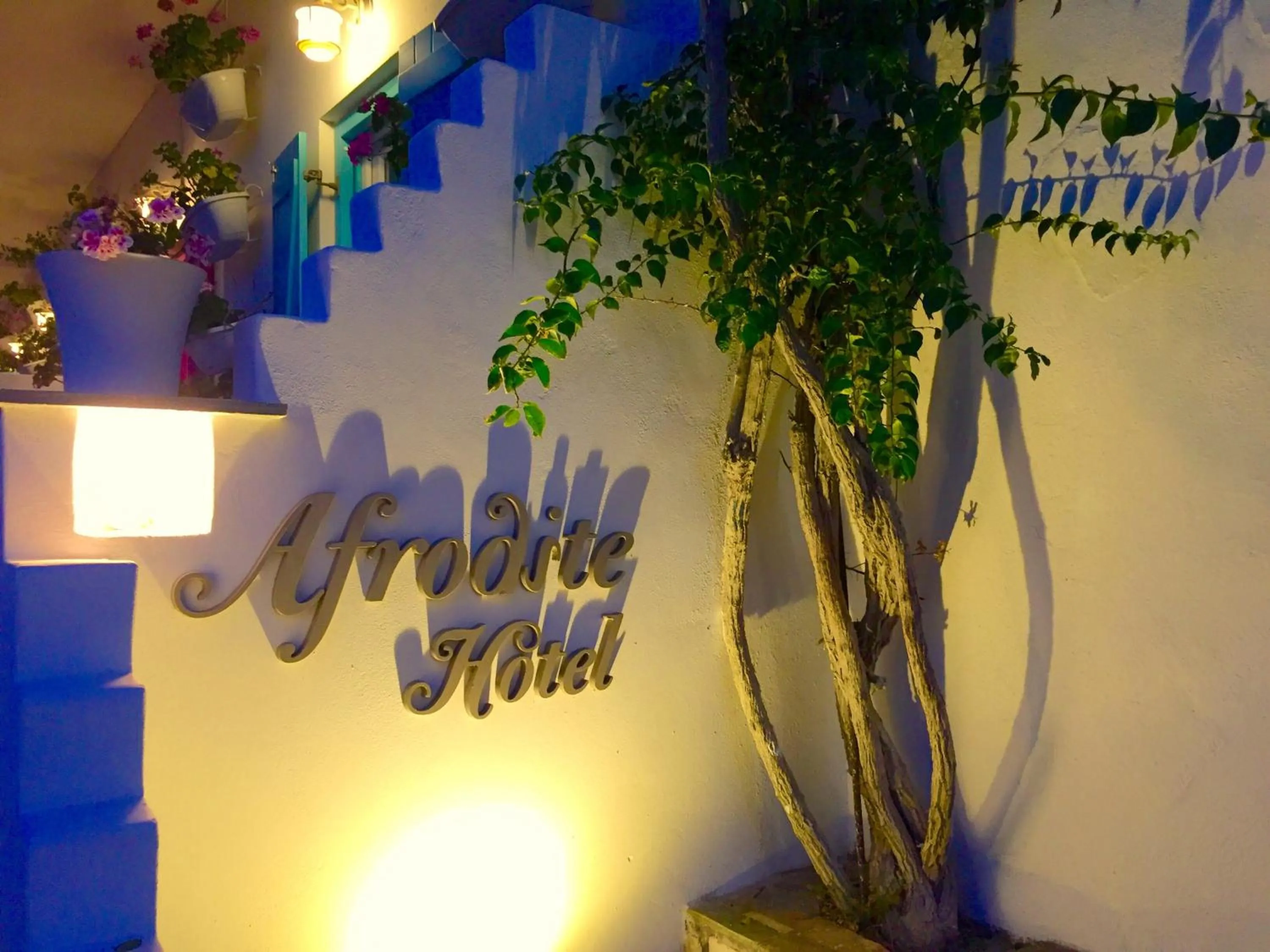 Property logo or sign in Aphrodite Boutique Hotel