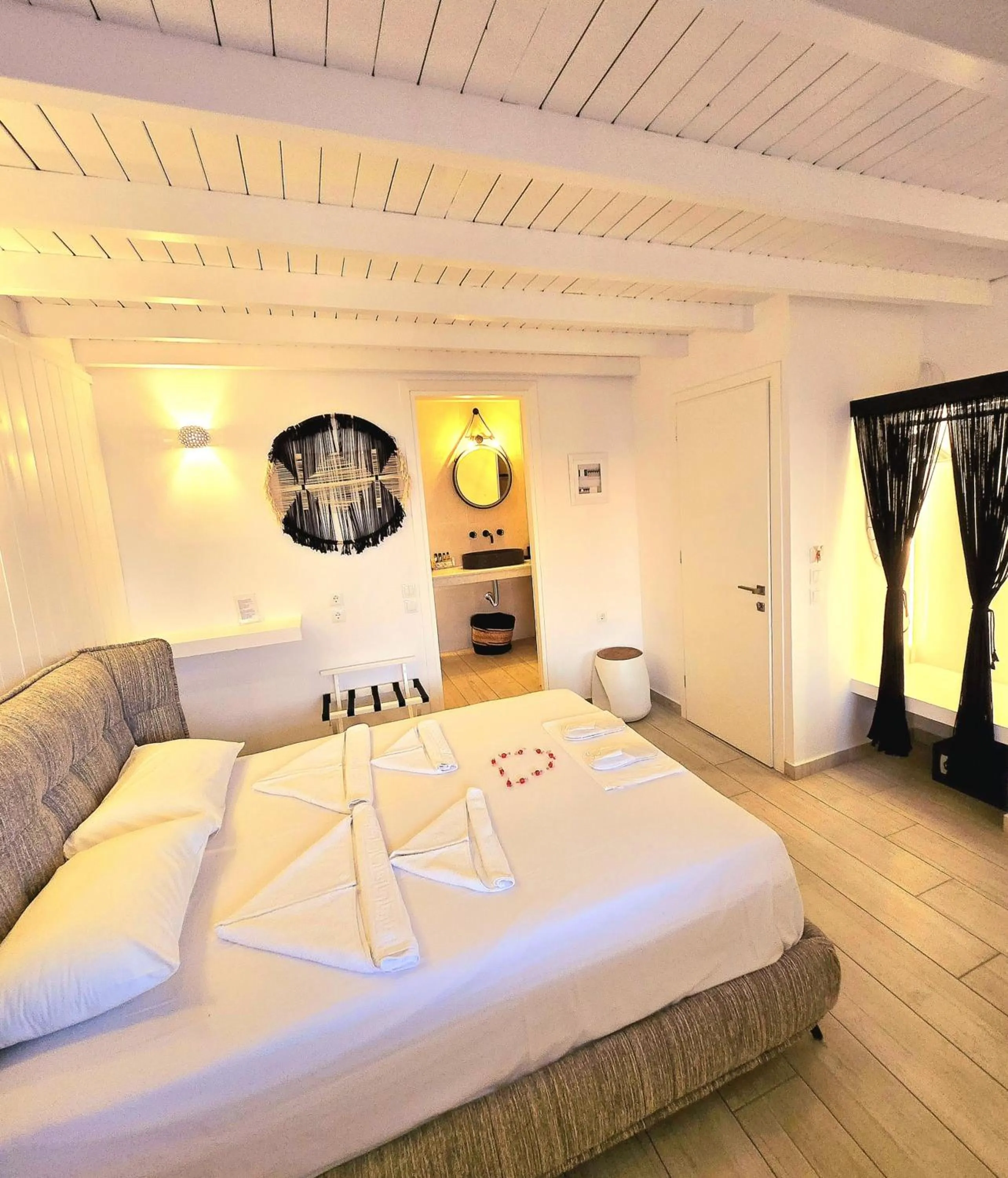 Bed in Aphrodite Boutique Hotel