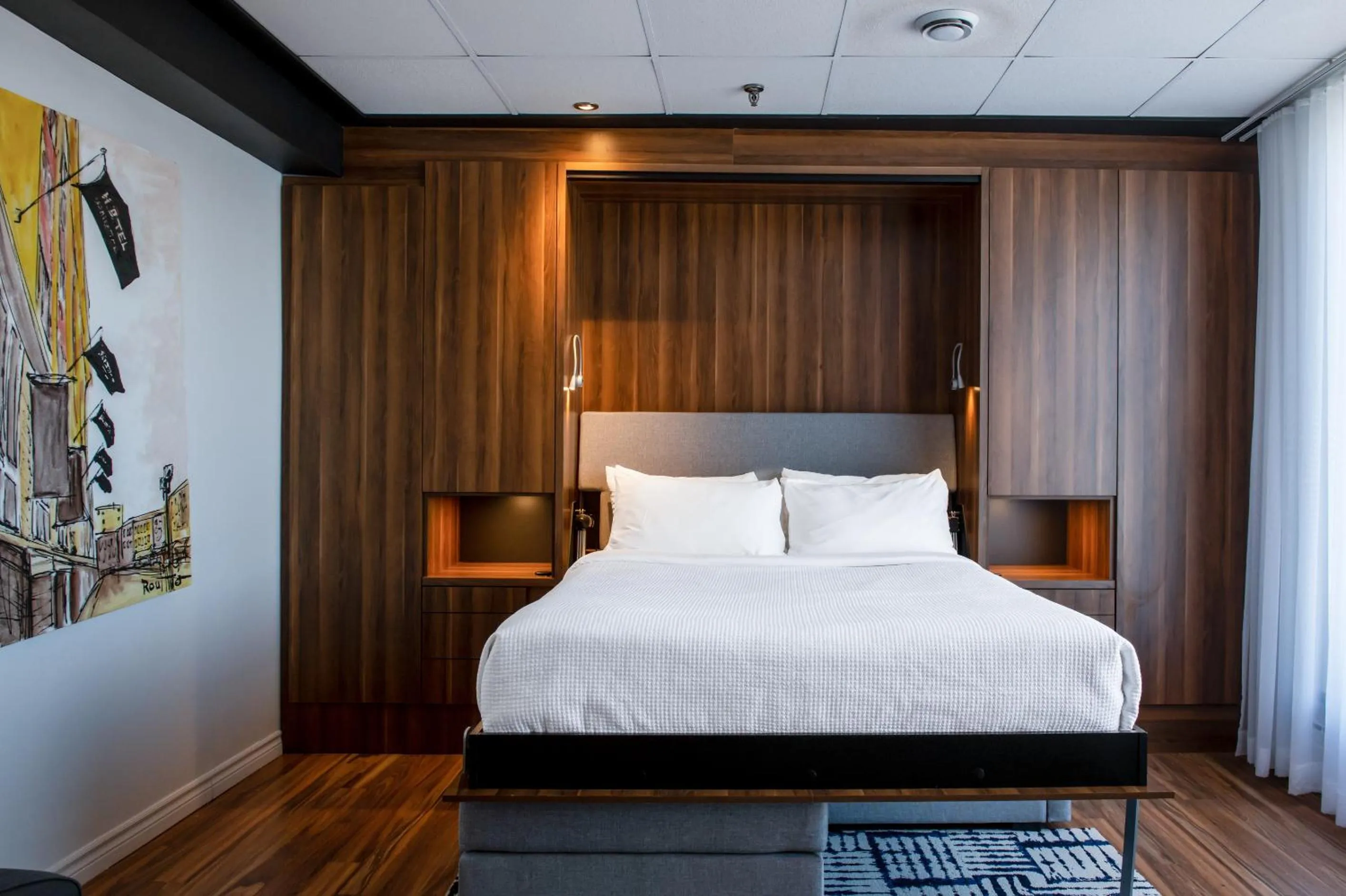 Bed in Hotel Chicoutimi, affilié à Hyvi