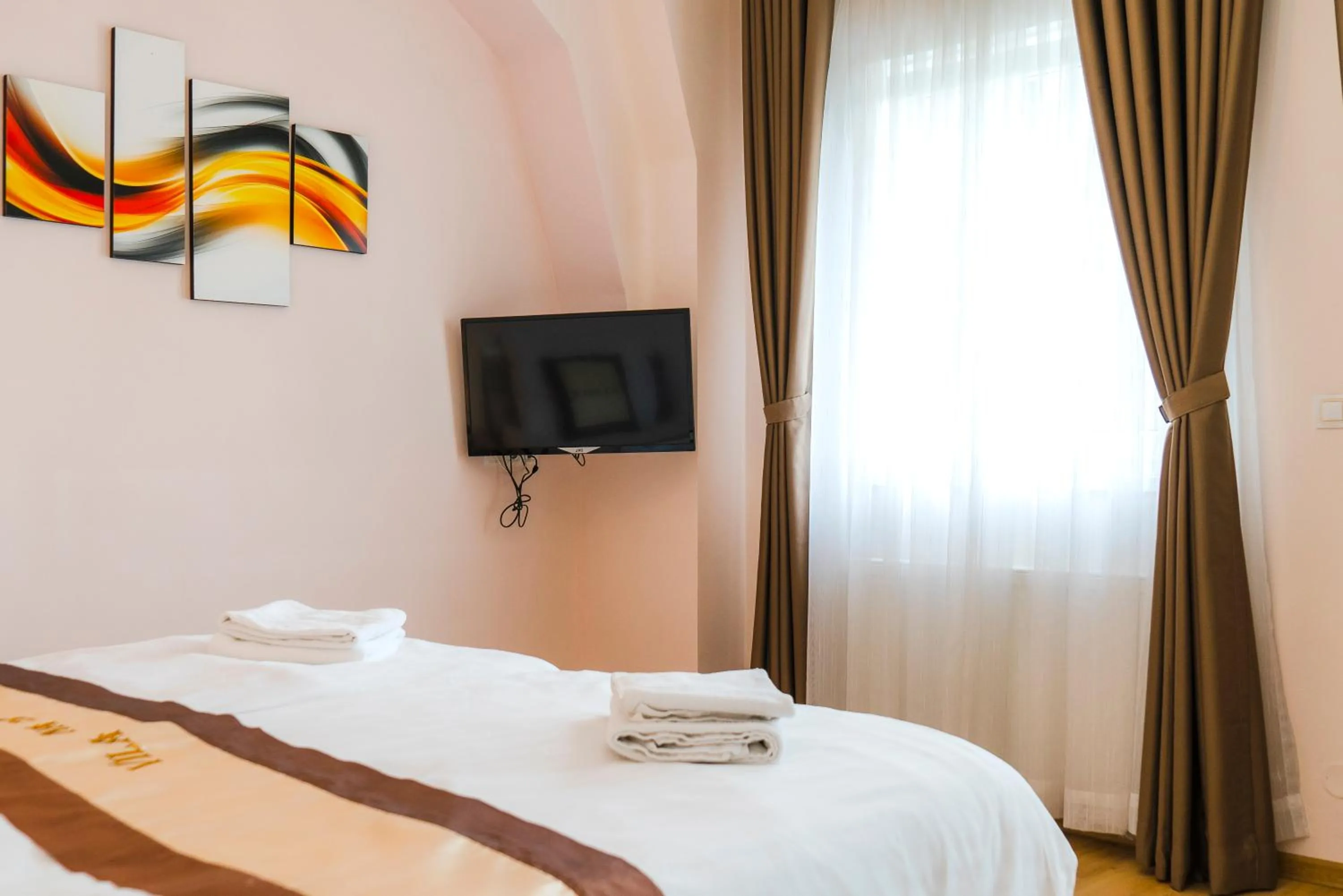 Bed in Diana Apartments Karlovy Vary