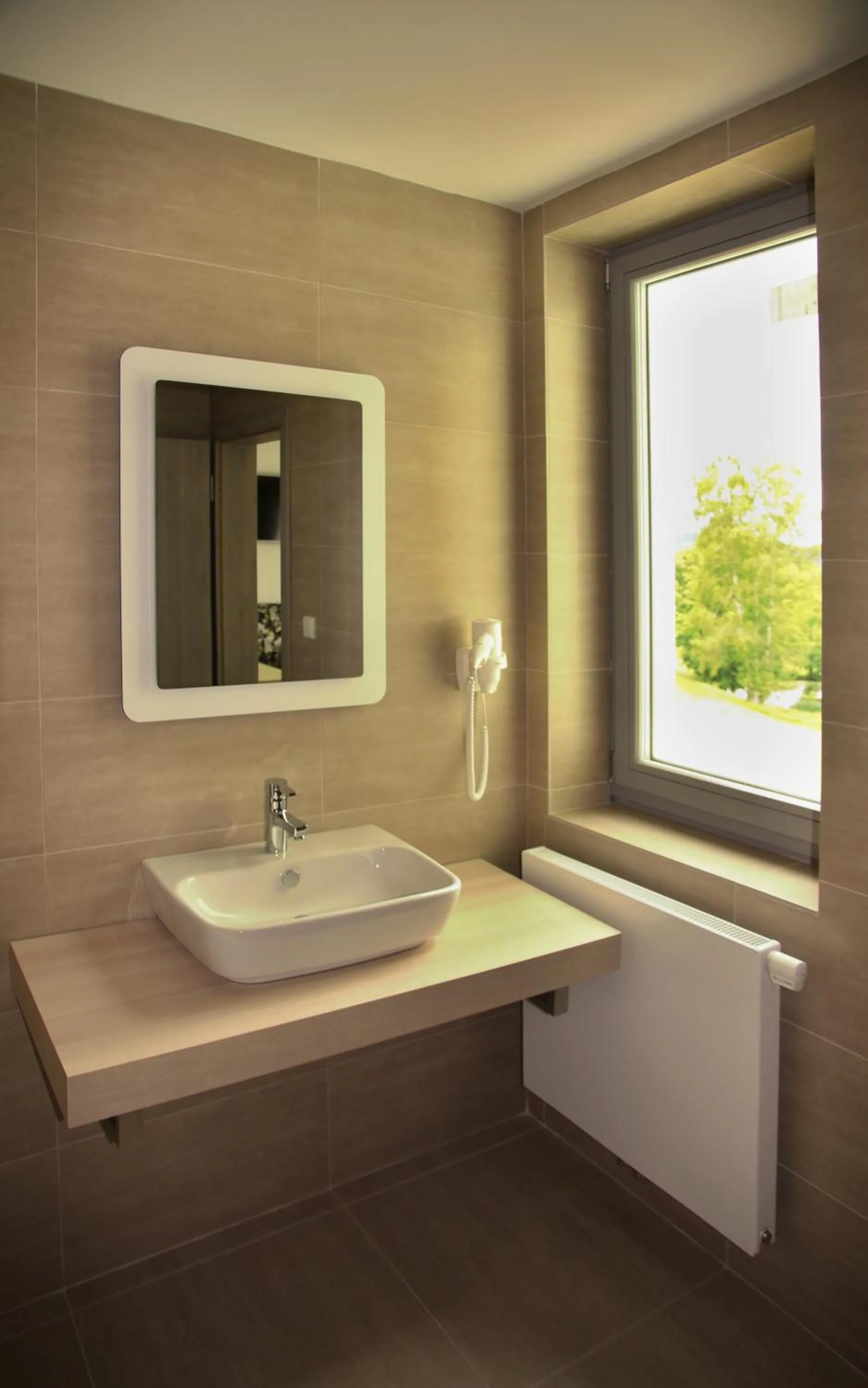 Bathroom in Hotel Devítka