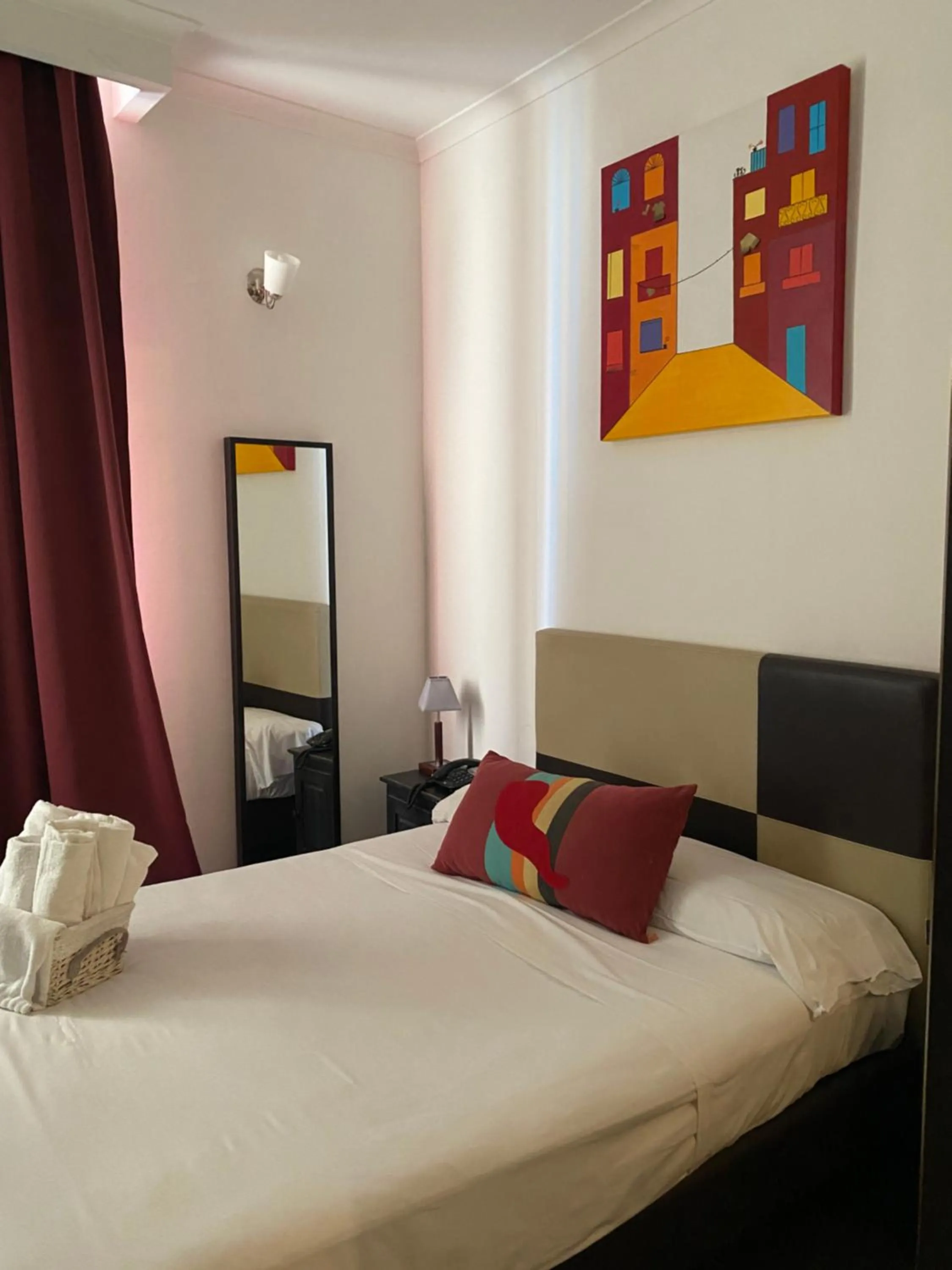 Bed in Hotel Plebiscito Aparthotel