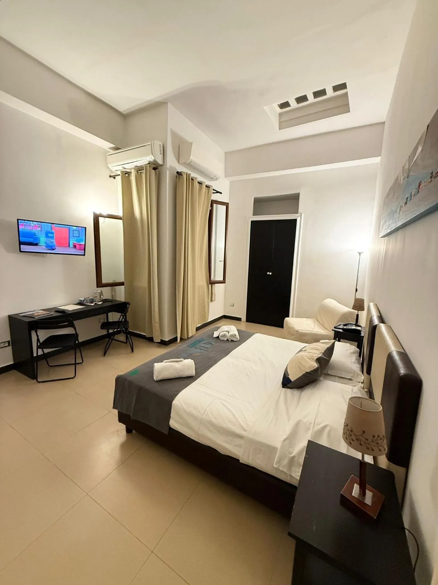 Photo of the whole room, Bed in Hotel Plebiscito Aparthotel