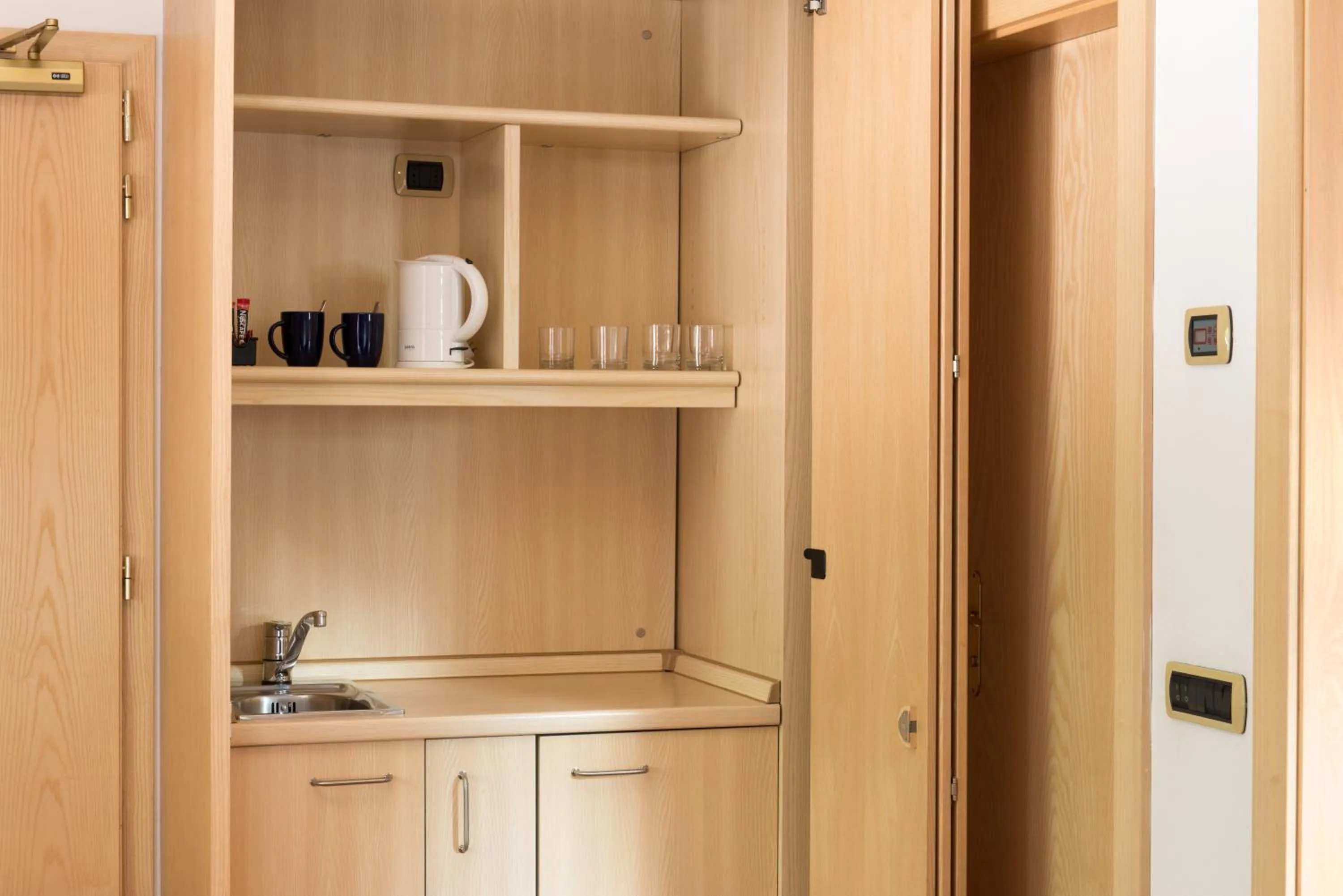 Kitchen or kitchenette in Garni Aritz