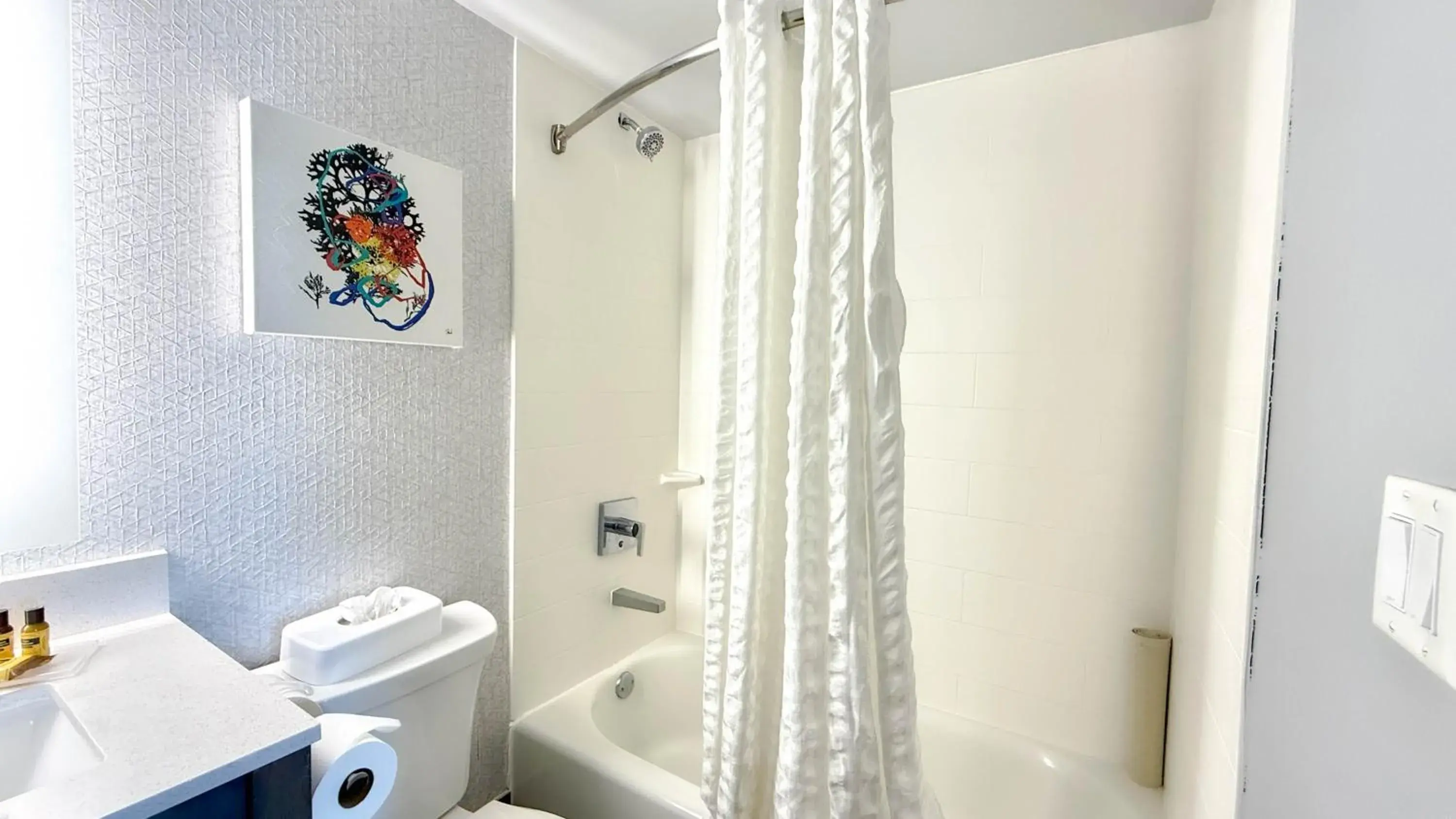 Two-Room Queen Suite with Two Queen Beds, Sofa Bed, Balcony, Partial Ocean View and Kitchenette - Non-Smoking in Best Western Plus Daytona Inn Seabreeze Two-Room Queen Suite with Two Queen Beds, Sofa Bed, Balcony, Partial Ocean View and Kitchenette - Non-Smoking in Best Western Plus Daytona Inn Seabreeze