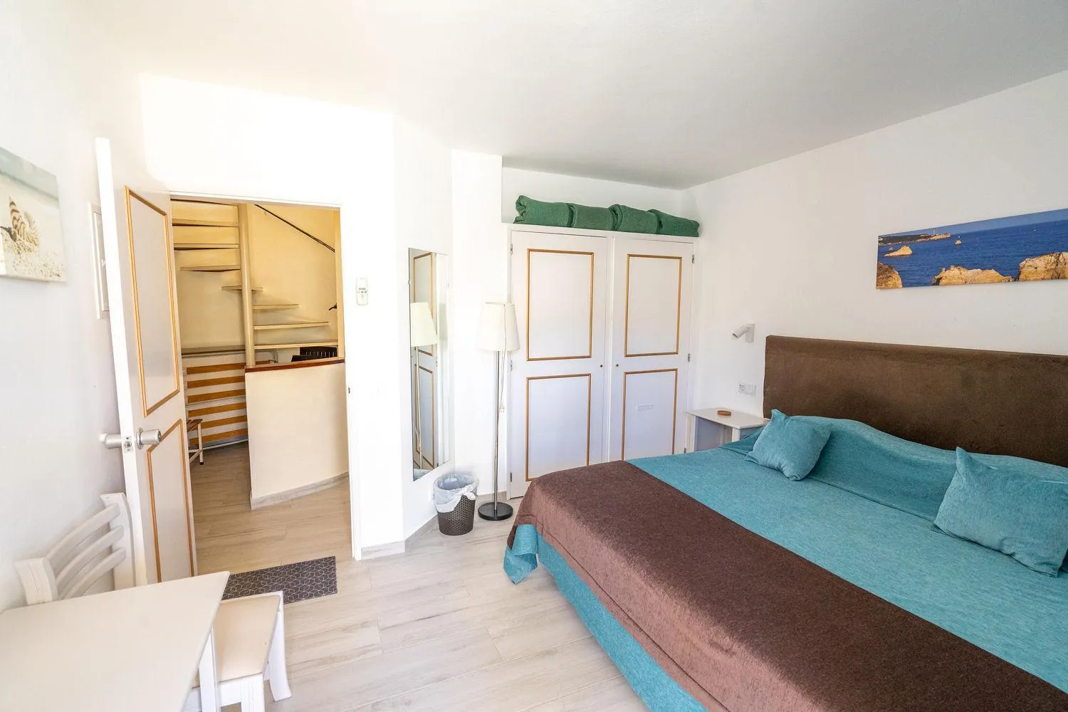 Bed in Luz Beach Apartments