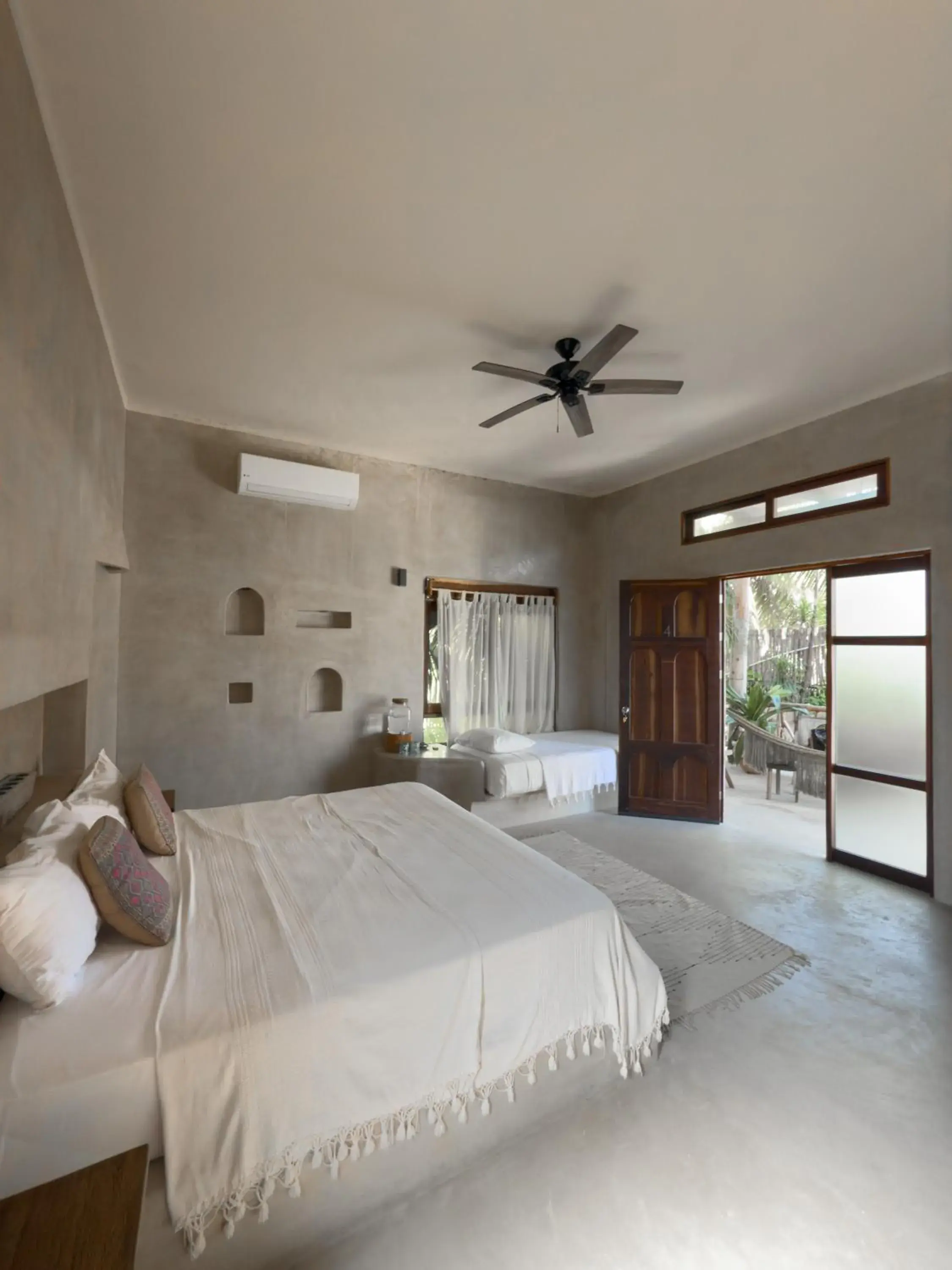 Bed in La Posada del Sol Boutique Hotel Tulum Bed in La Posada del Sol Boutique Hotel Tulum