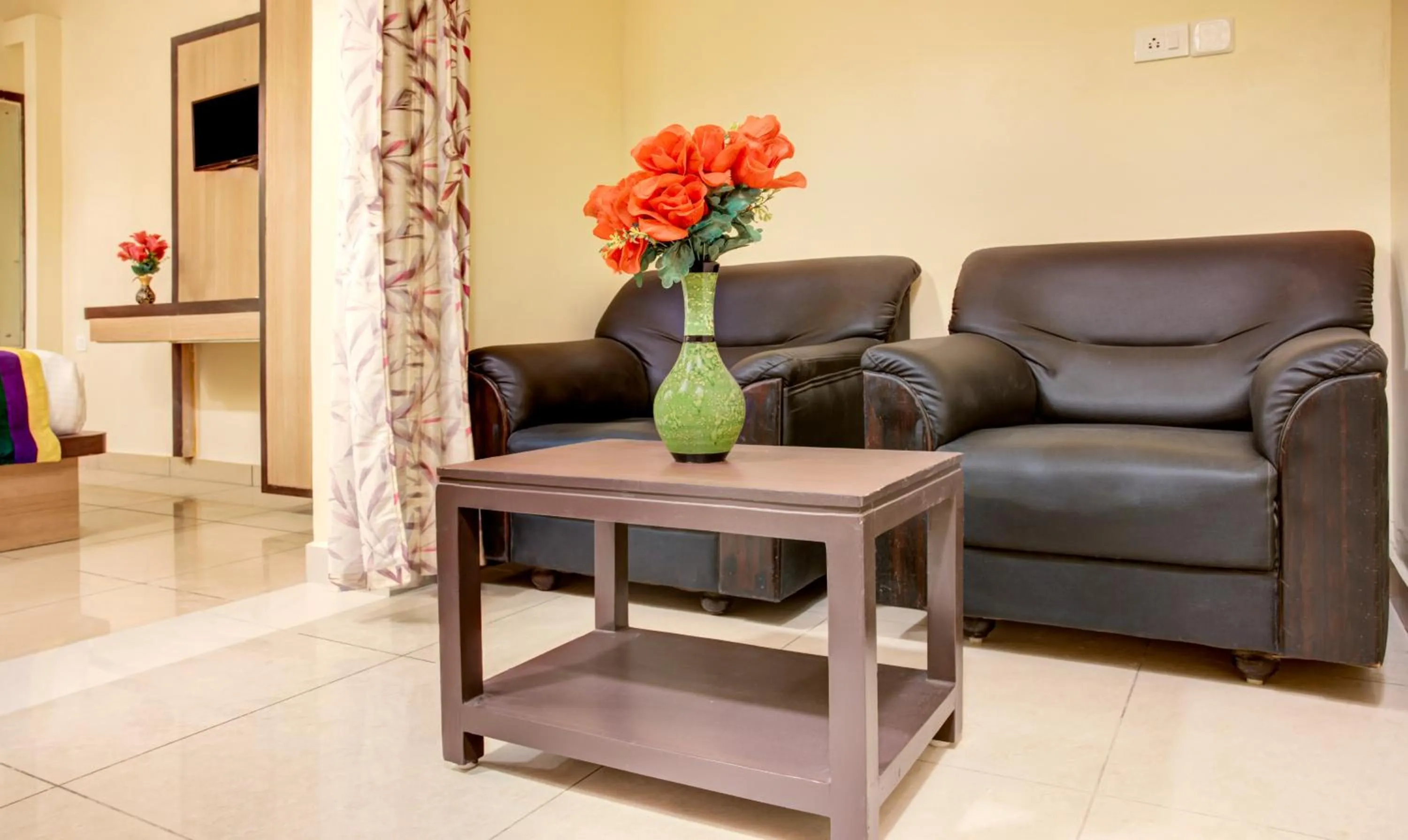 Seating area in Treebo Golden Inn, 700 Mtrs From Promenade Beach