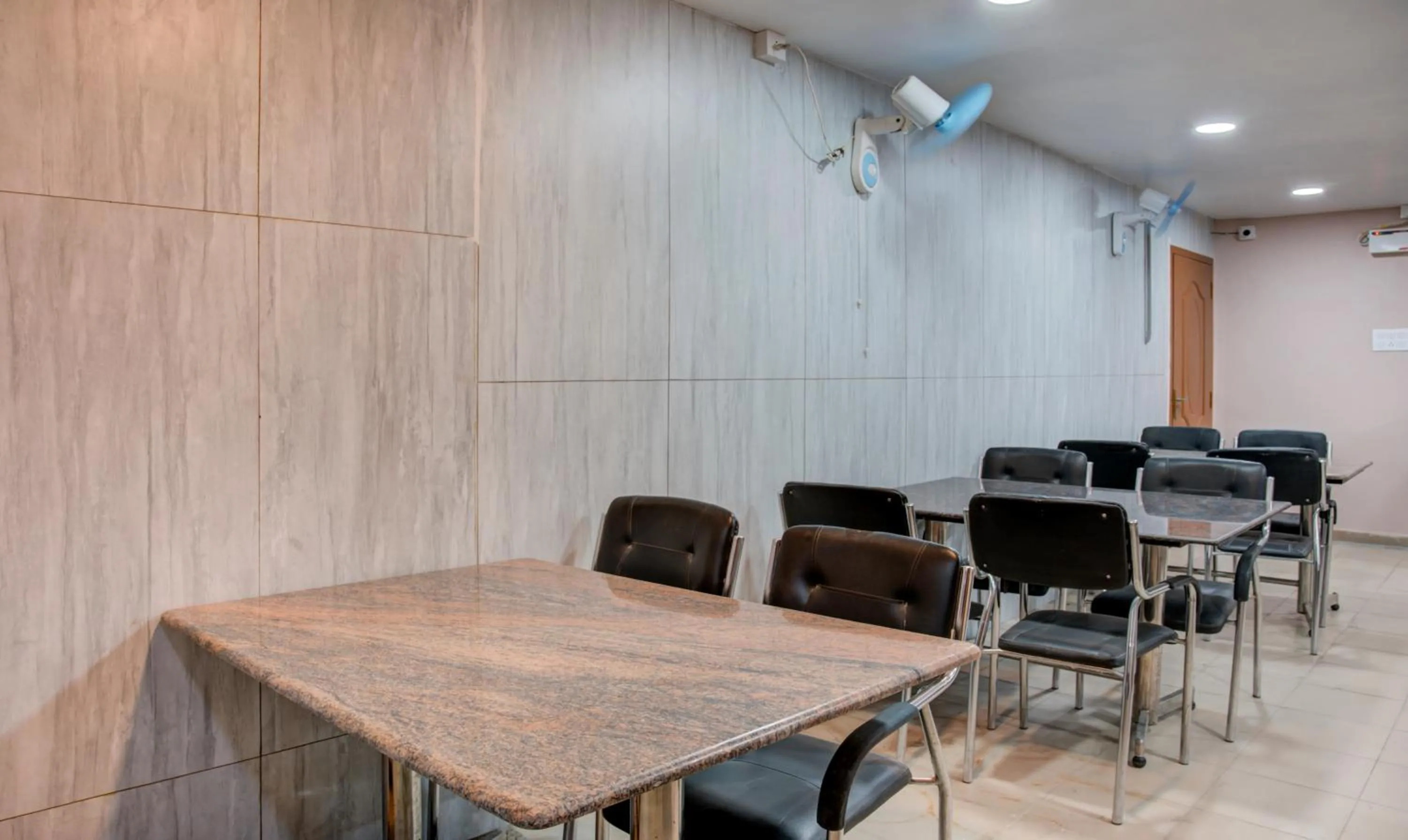 Dining area in Treebo Golden Inn, 700 Mtrs From Promenade Beach