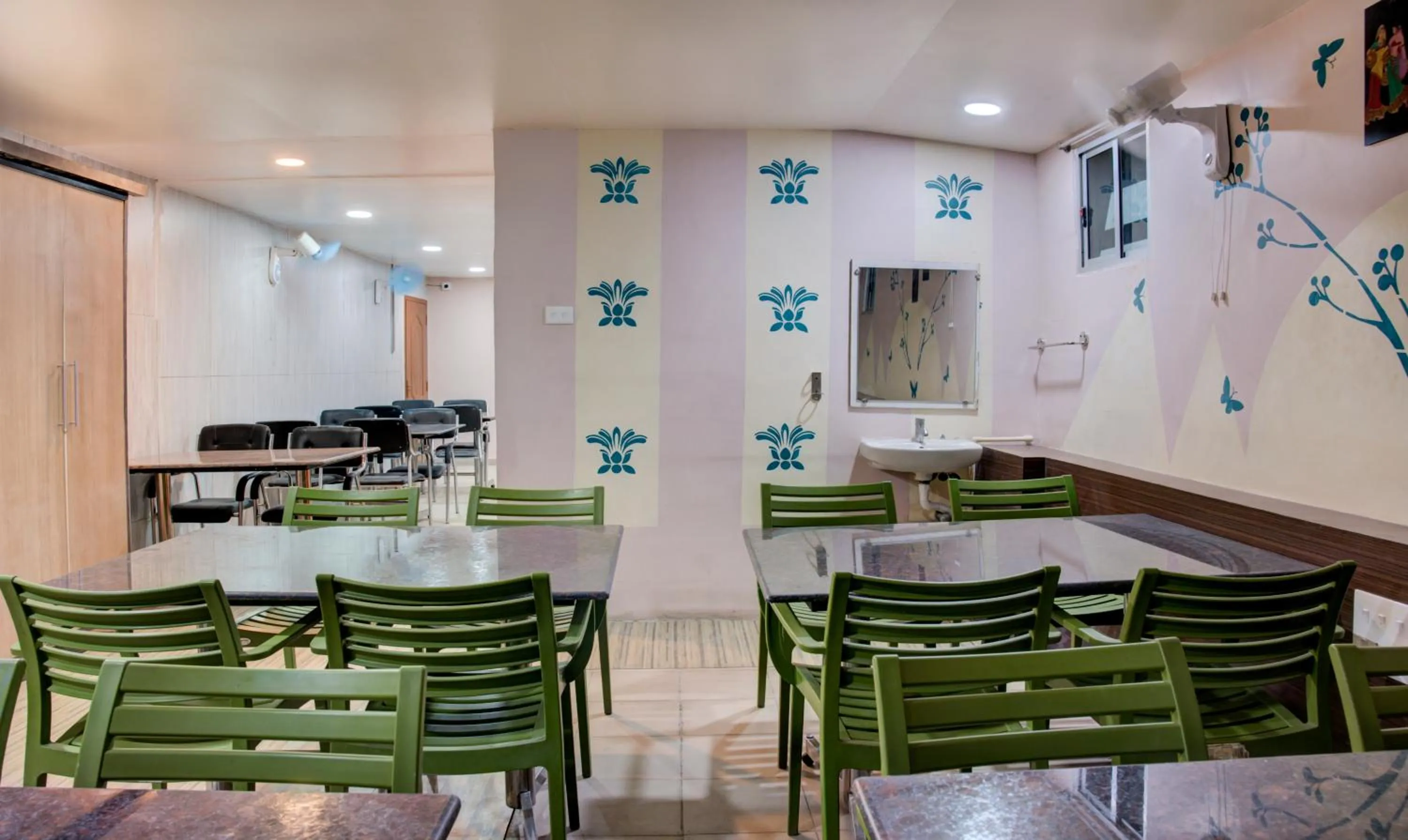 Dining area in Treebo Golden Inn, 700 Mtrs From Promenade Beach