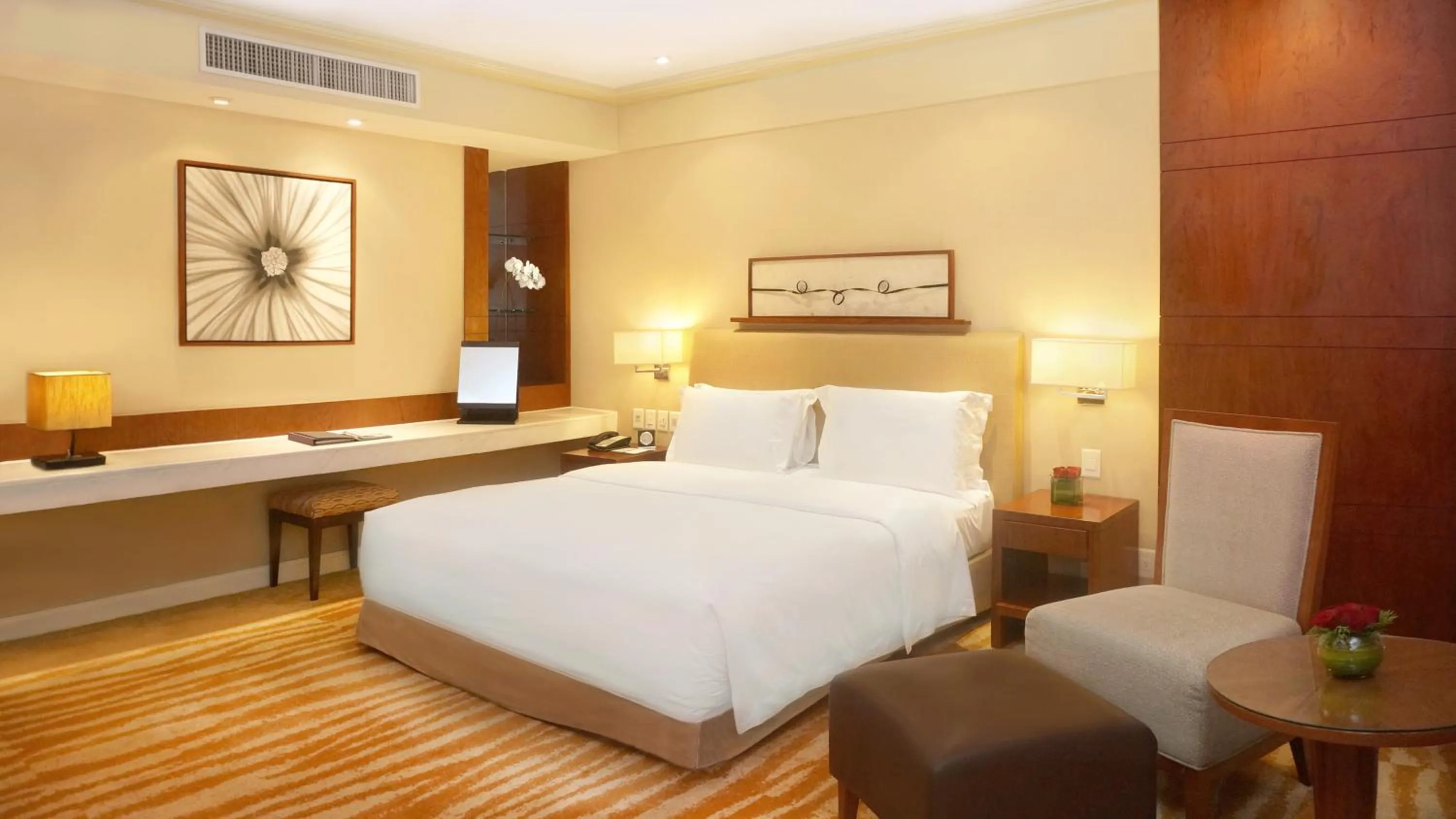 Bed in New Coast Hotel Manila