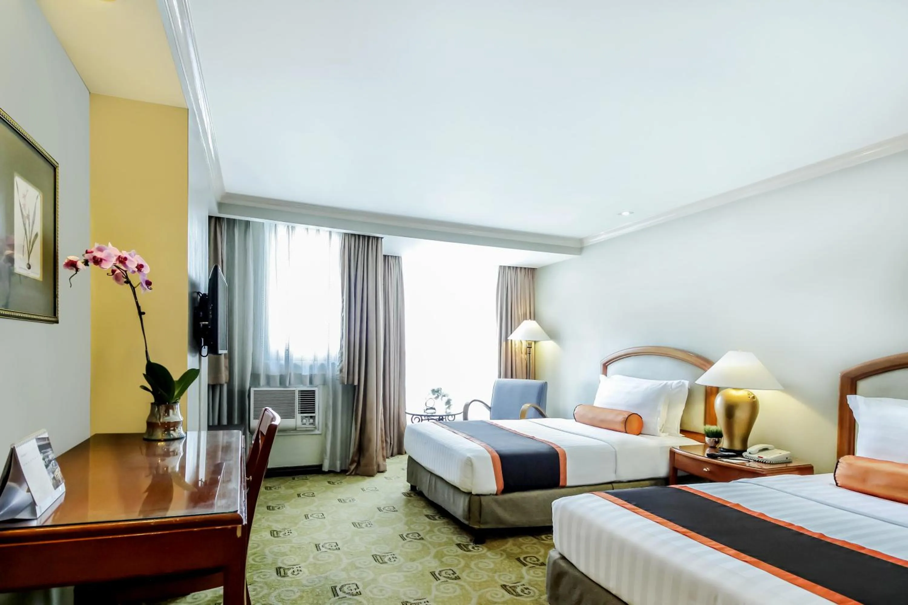 Bed in Makati Palace Hotel