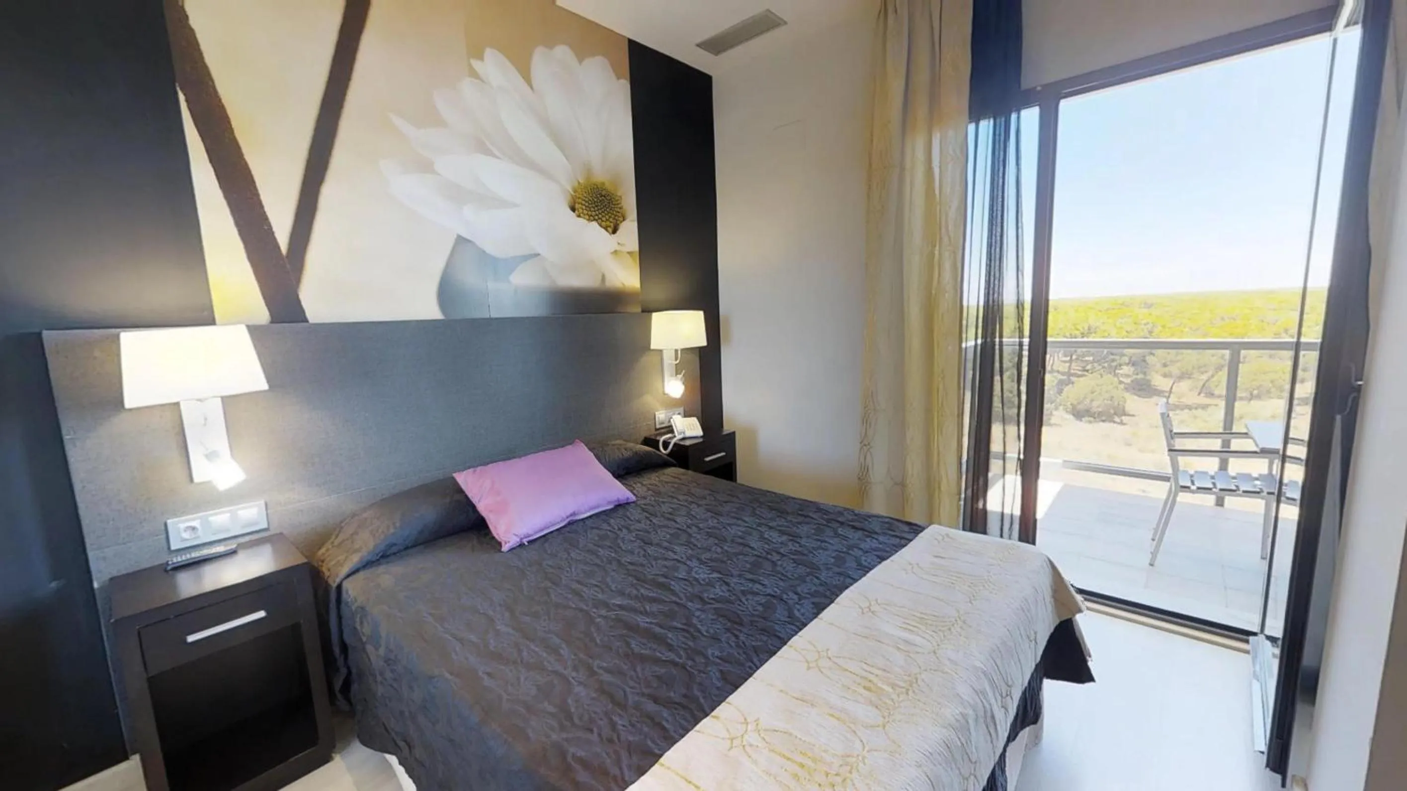 Bed in Leo Deluxe Punta Umbría