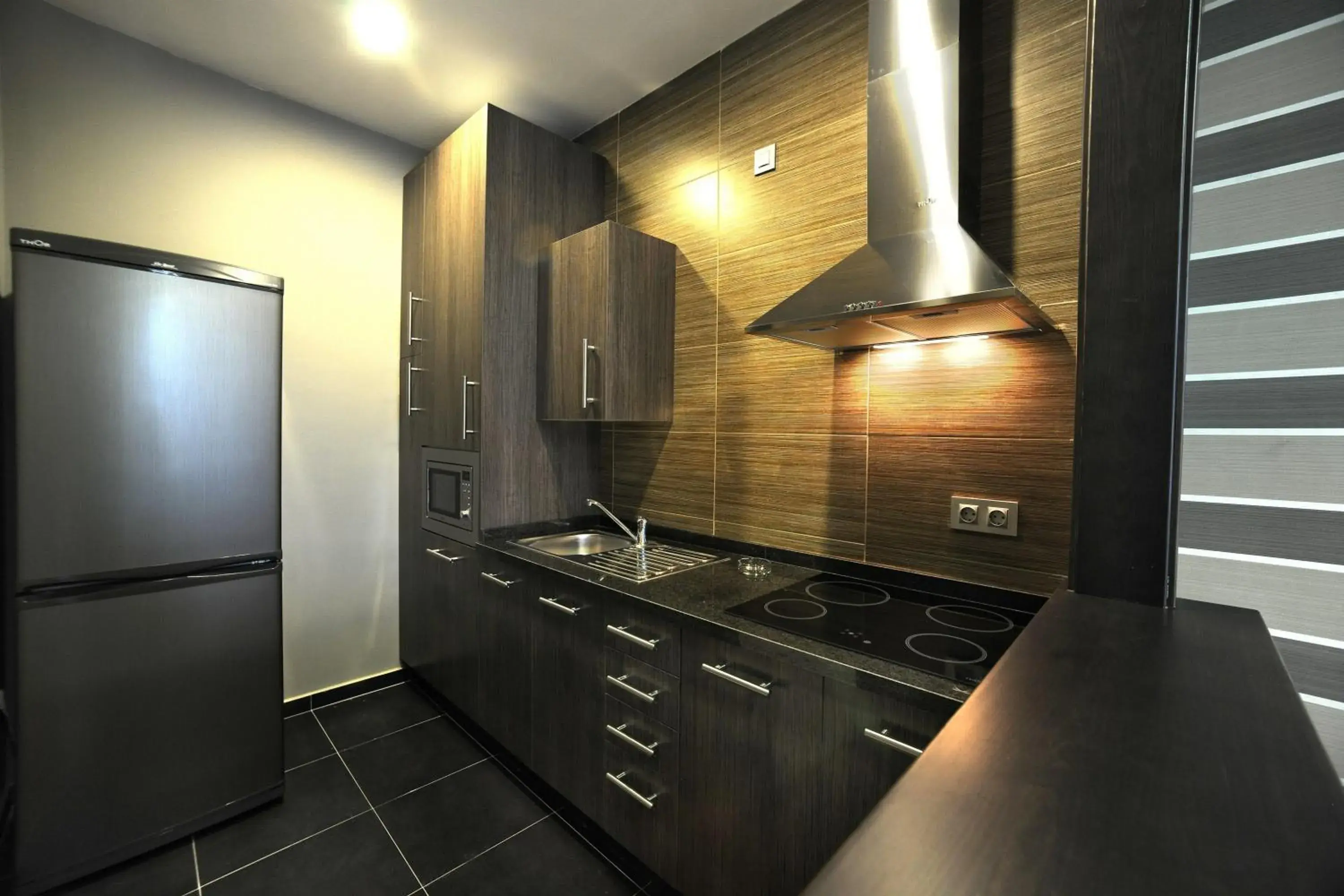 Kitchen or kitchenette in Leo Deluxe Punta Umbría Kitchen or kitchenette in Leo Deluxe Punta Umbría