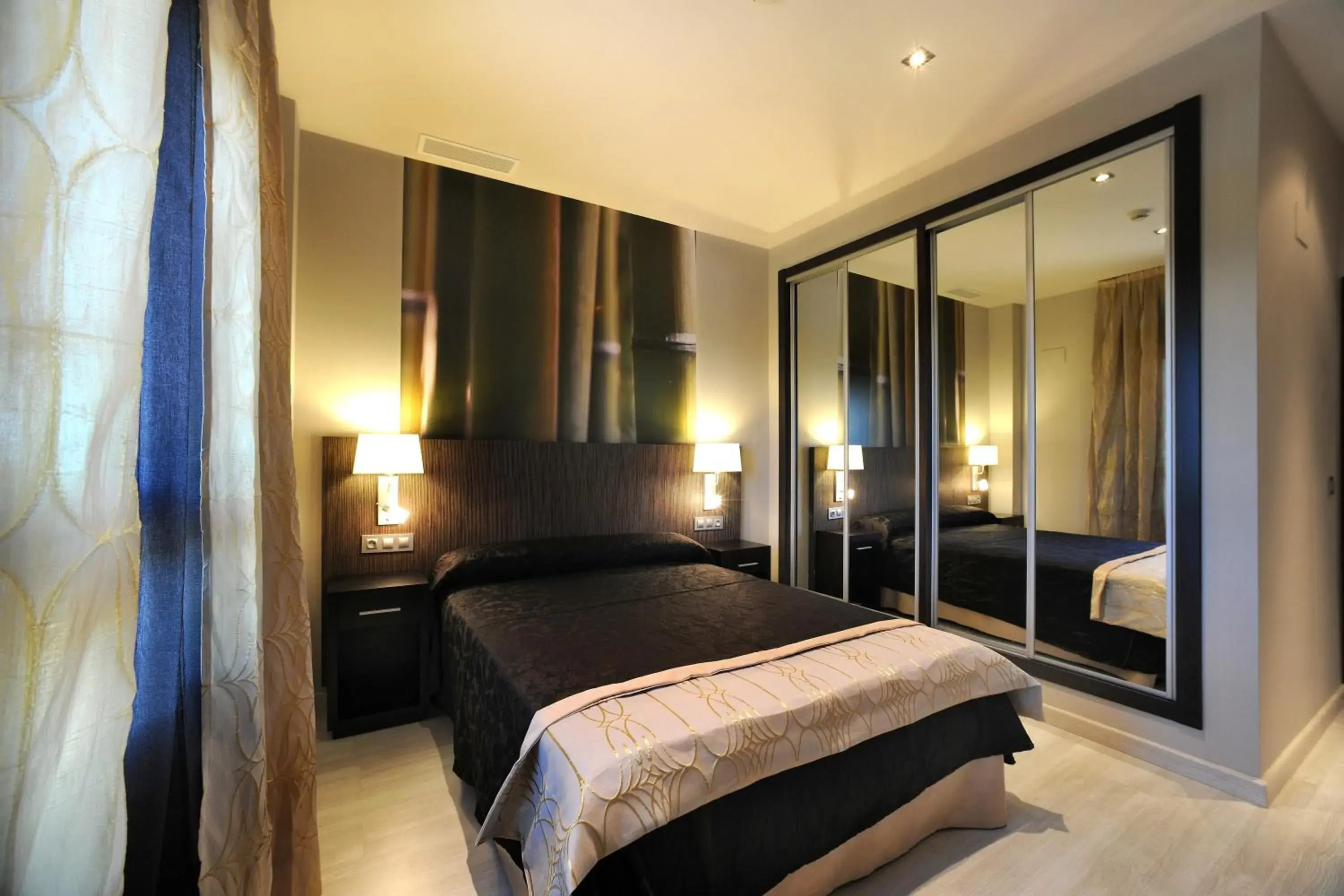 Bed in Leo Deluxe Punta Umbría Bed in Leo Deluxe Punta Umbría