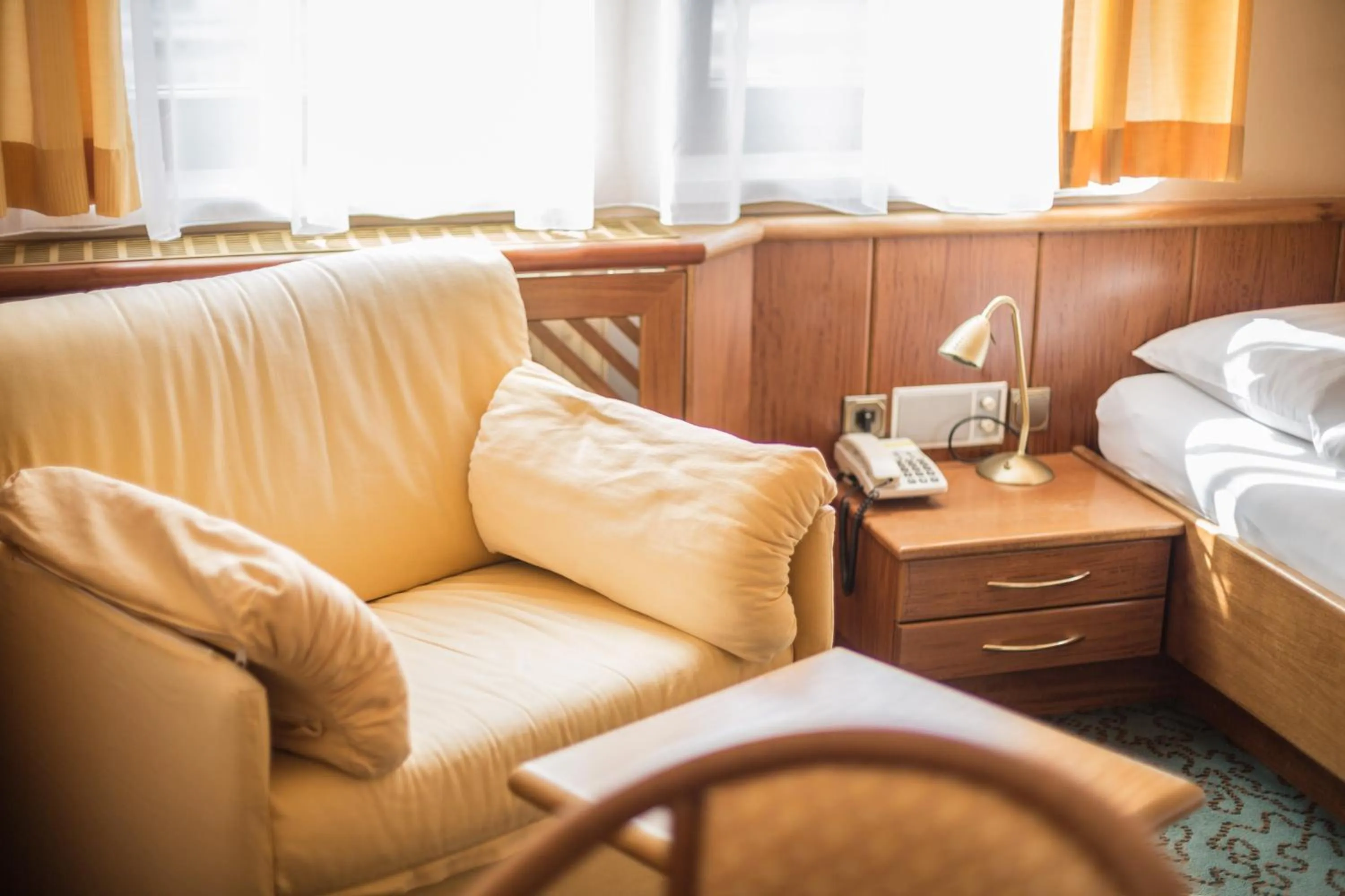 Seating area, Bed in Hotel Eitljörg