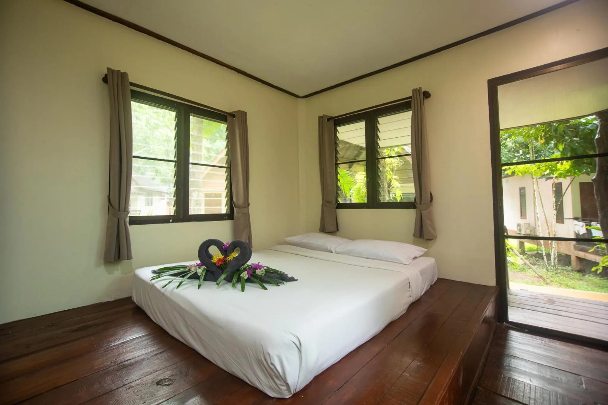 Bed in The Vatika Resort and Spa