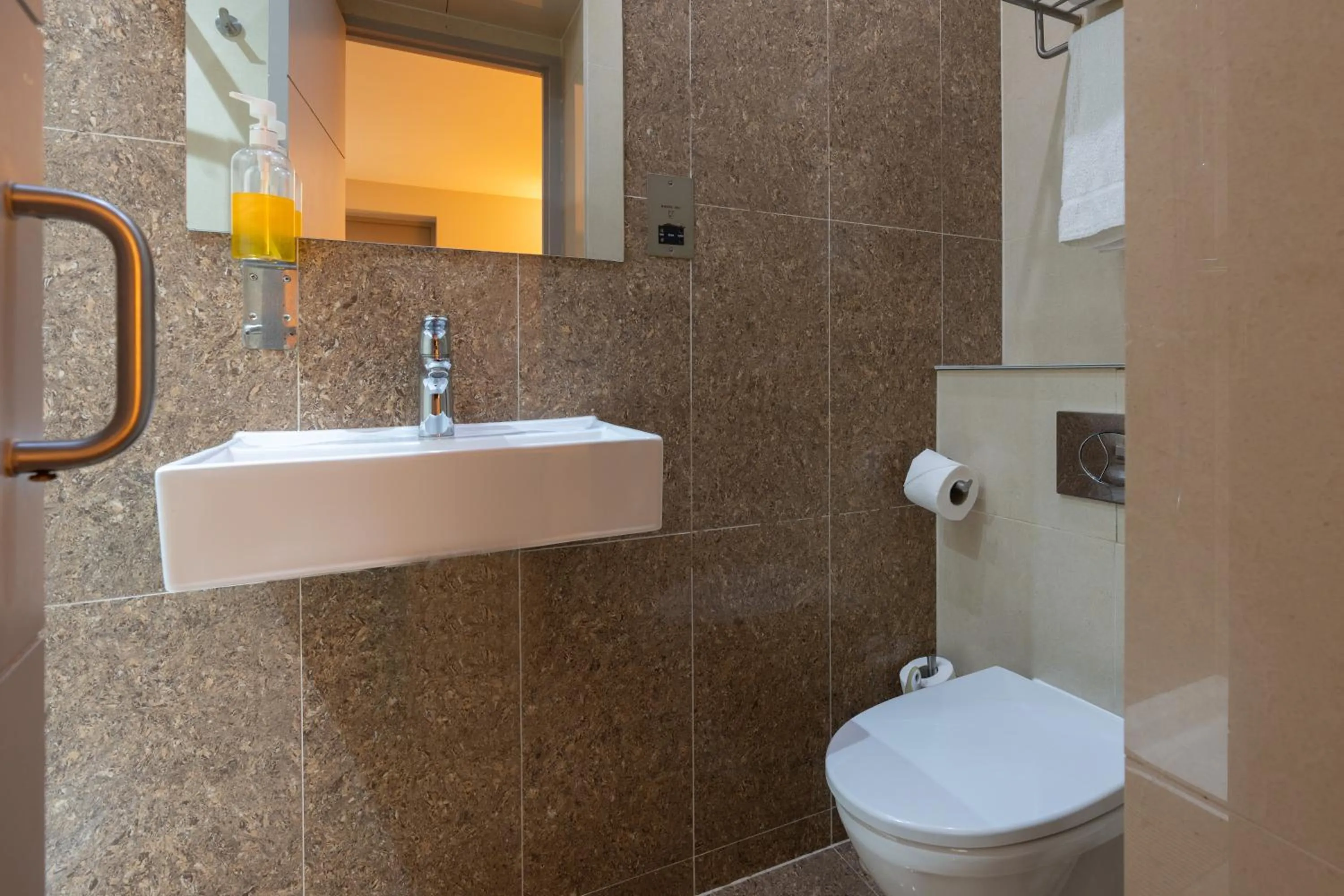 Bathroom in Simply Rooms & Suites