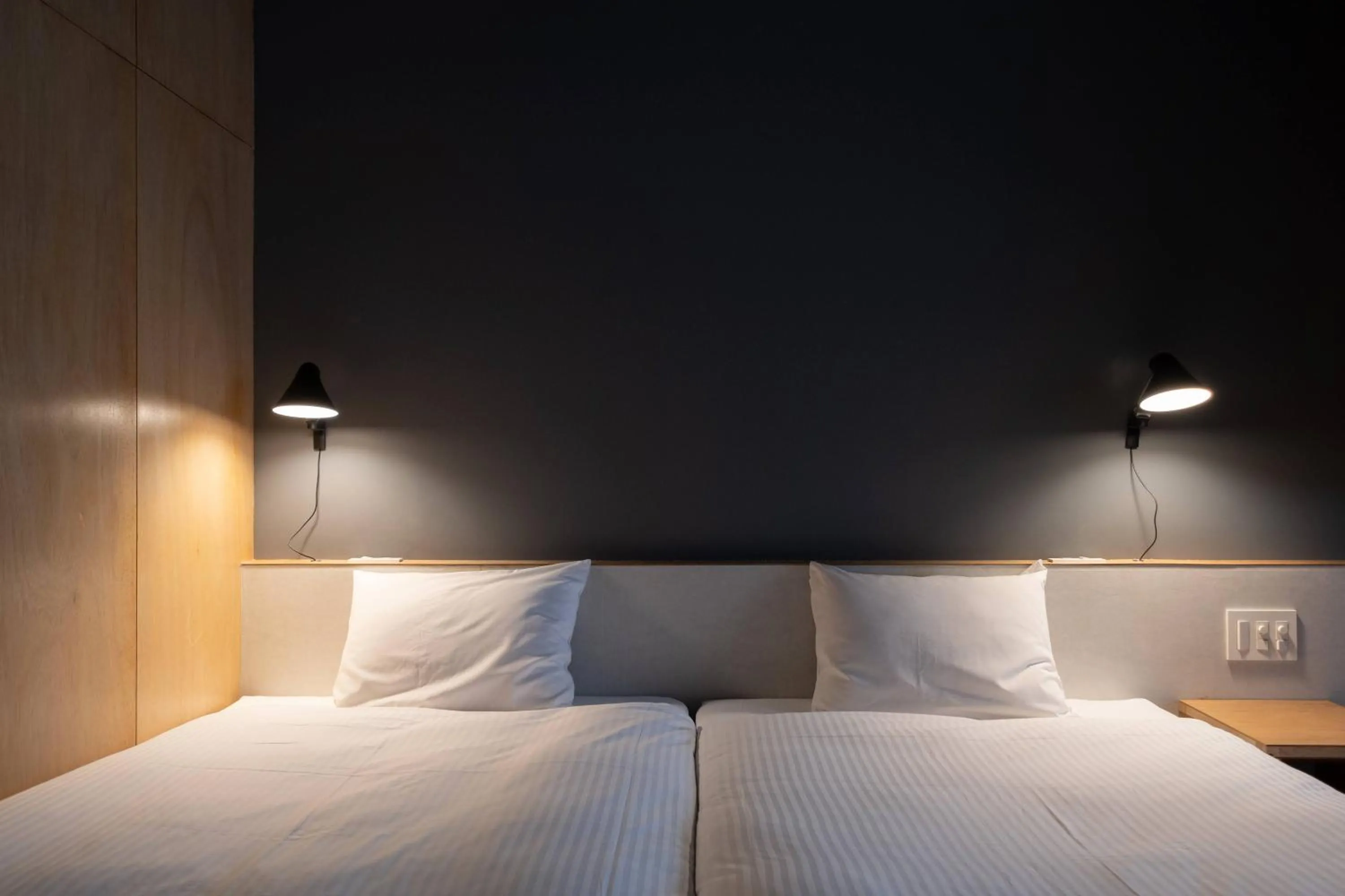 Photo of the whole room, Bed in KUMU Kanazawa by THE SHARE HOTELS