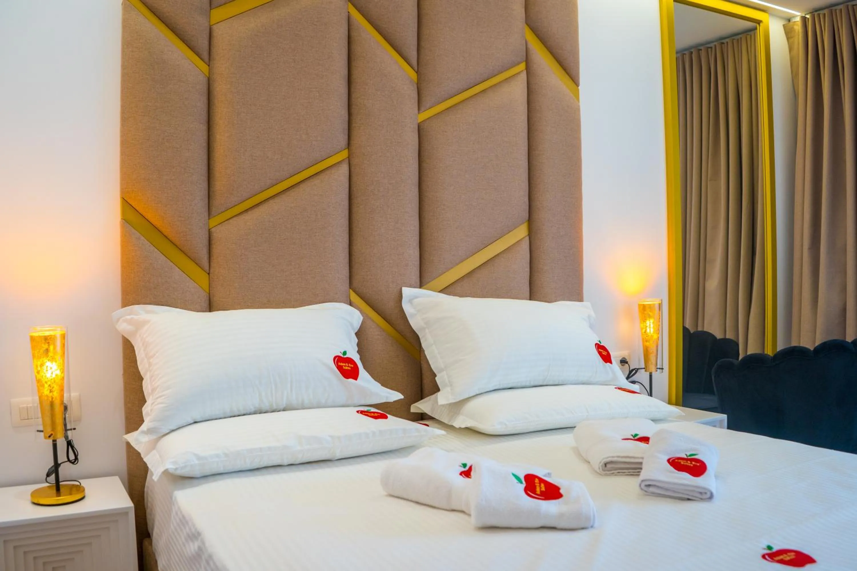 Bed in Adam & Eve Suites