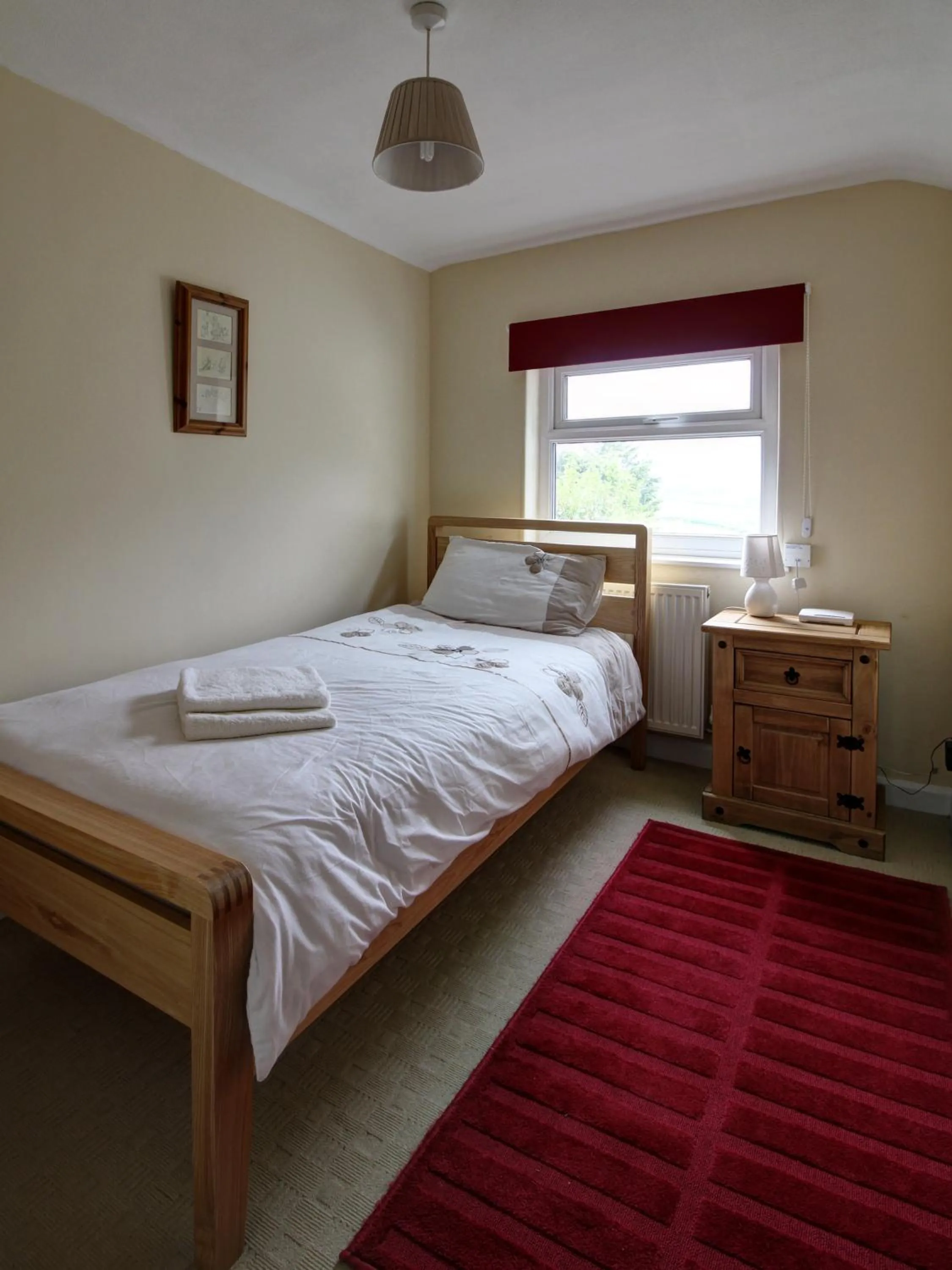 Bed in Bryn Ffynnon Holiday Cottage Llanrwst