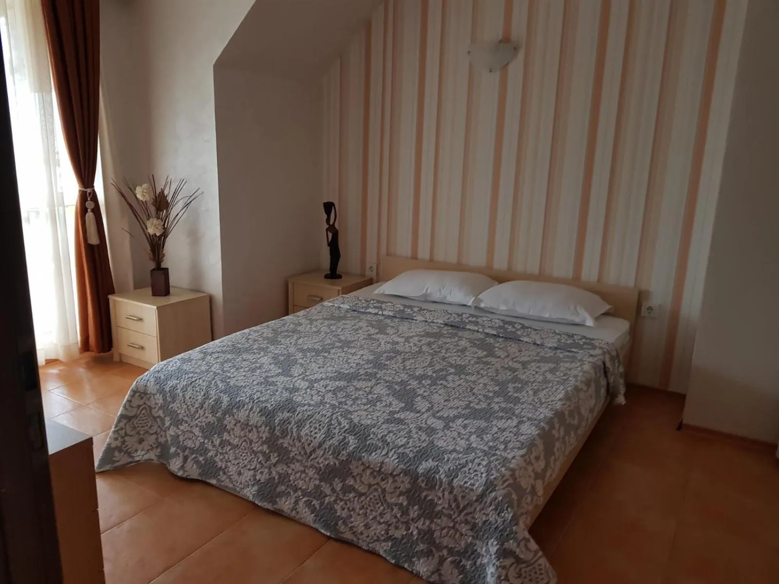 Bed in Sunrise Hotel