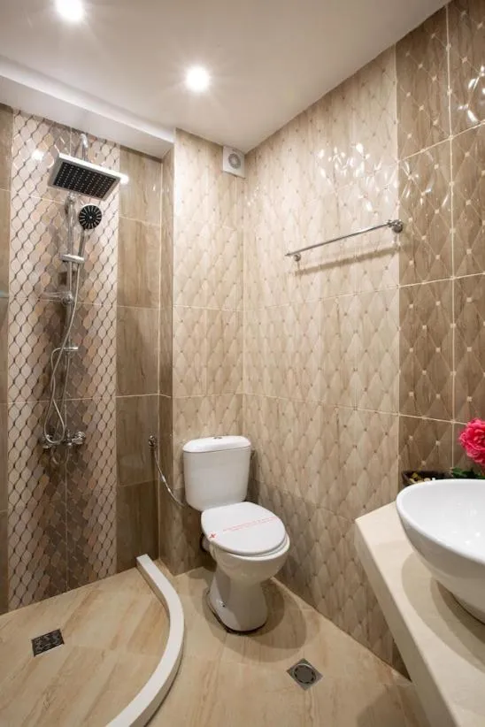 Bathroom in Sunrise Hotel