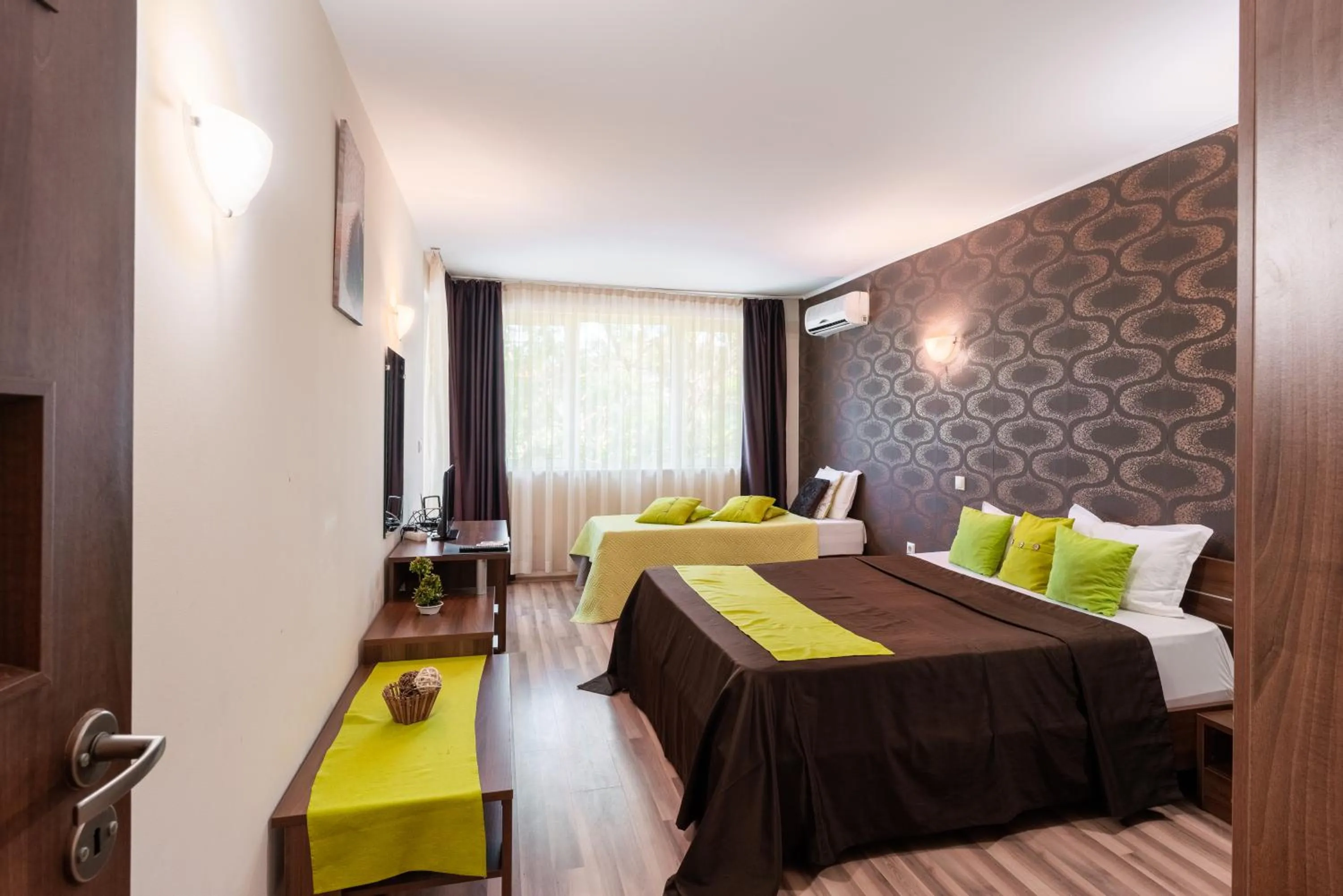 Bed in Sunrise Hotel