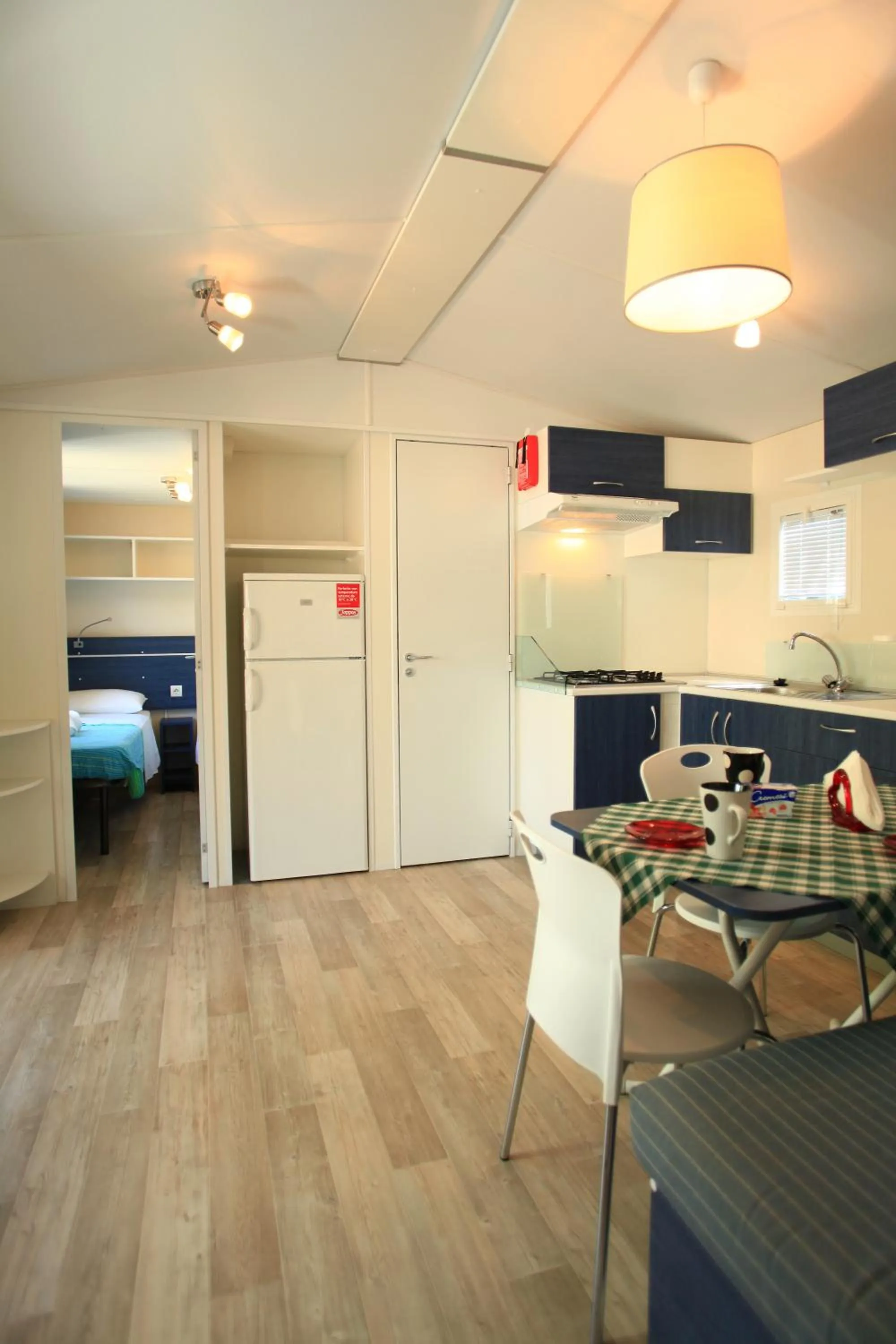 Kitchen or kitchenette in Camping Bella Italia