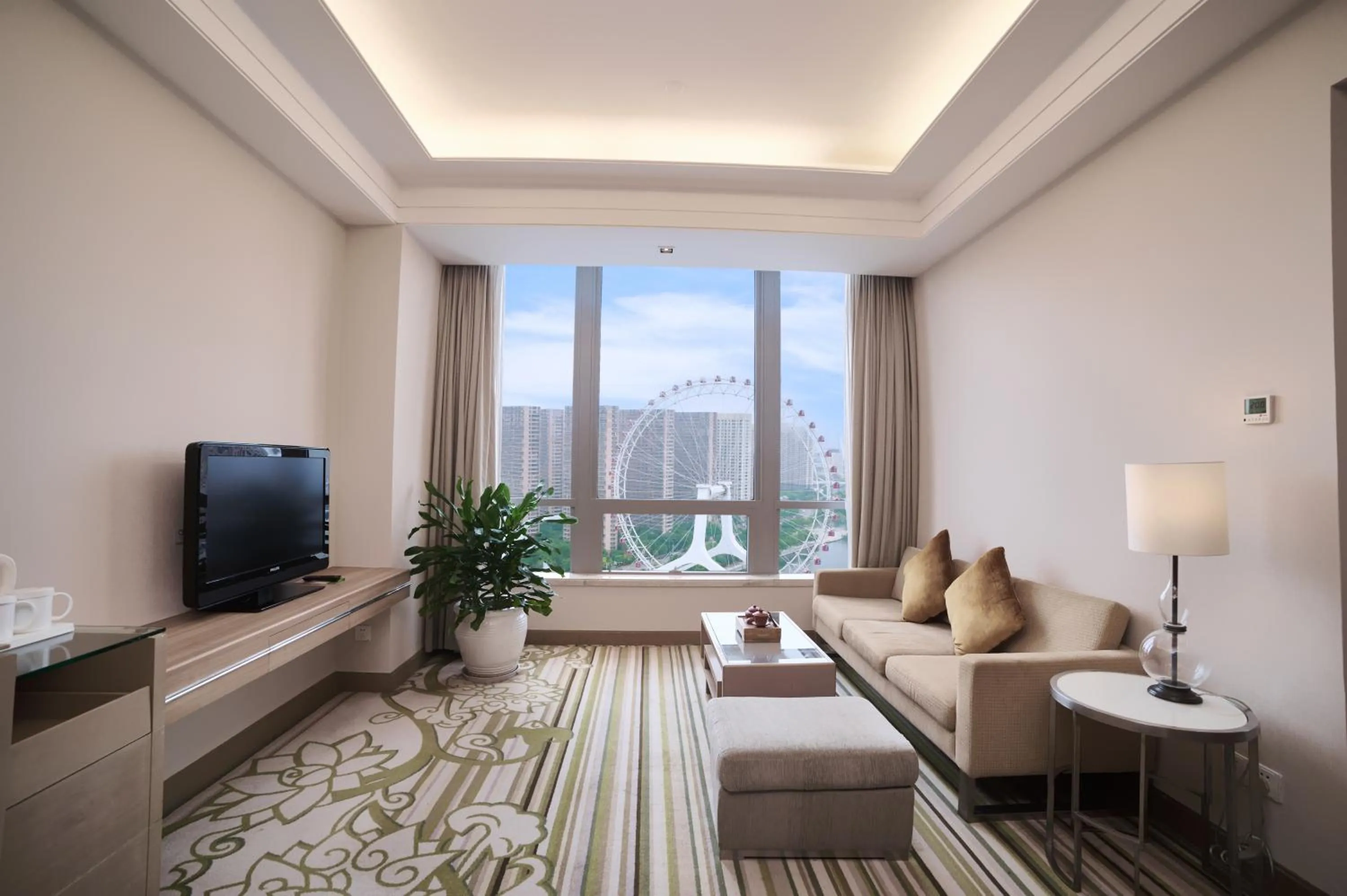 Living room in Holiday Inn Tianjin Riverside by IHG