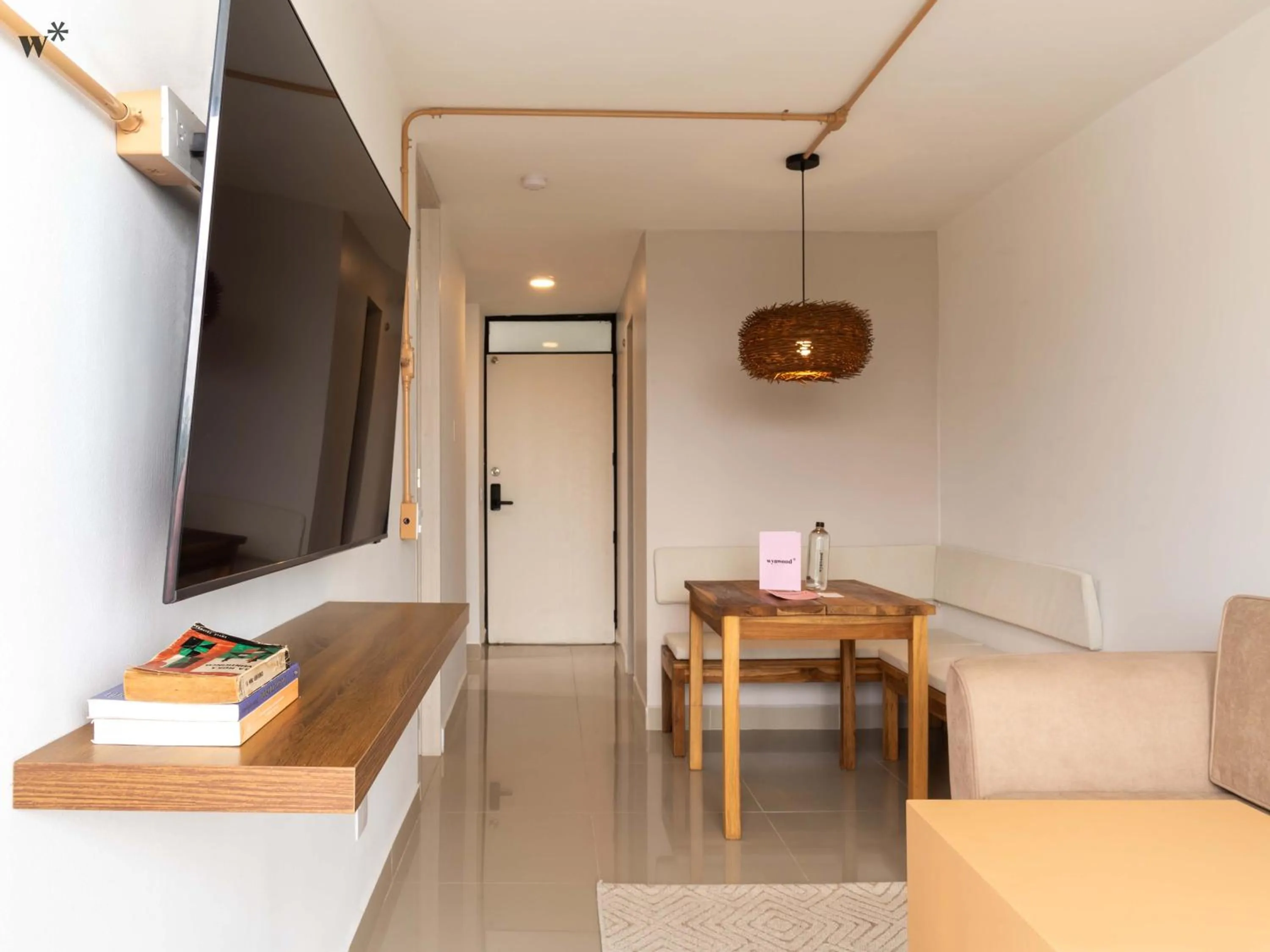 Communal lounge/ TV room in Hotel Santa Ana Medellin